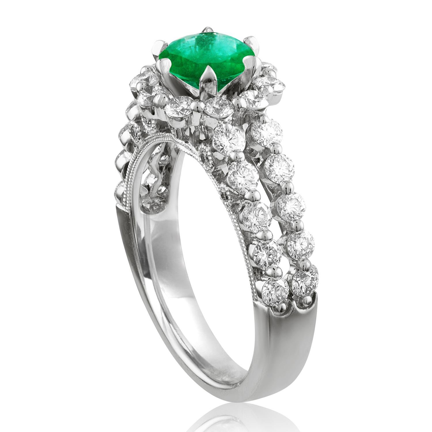 Beautiful Halo Emerald Milgrain Ring
The ring is 18K White Gold.
The Center is a beautiful round cut 0.82 Carat Emerald.
The Emerald is AGL certified.
There are 1.22 Carats in Diamonds F/G VS/SI
The ring is a size 6.25, sizable.
The ring weighs 5.8