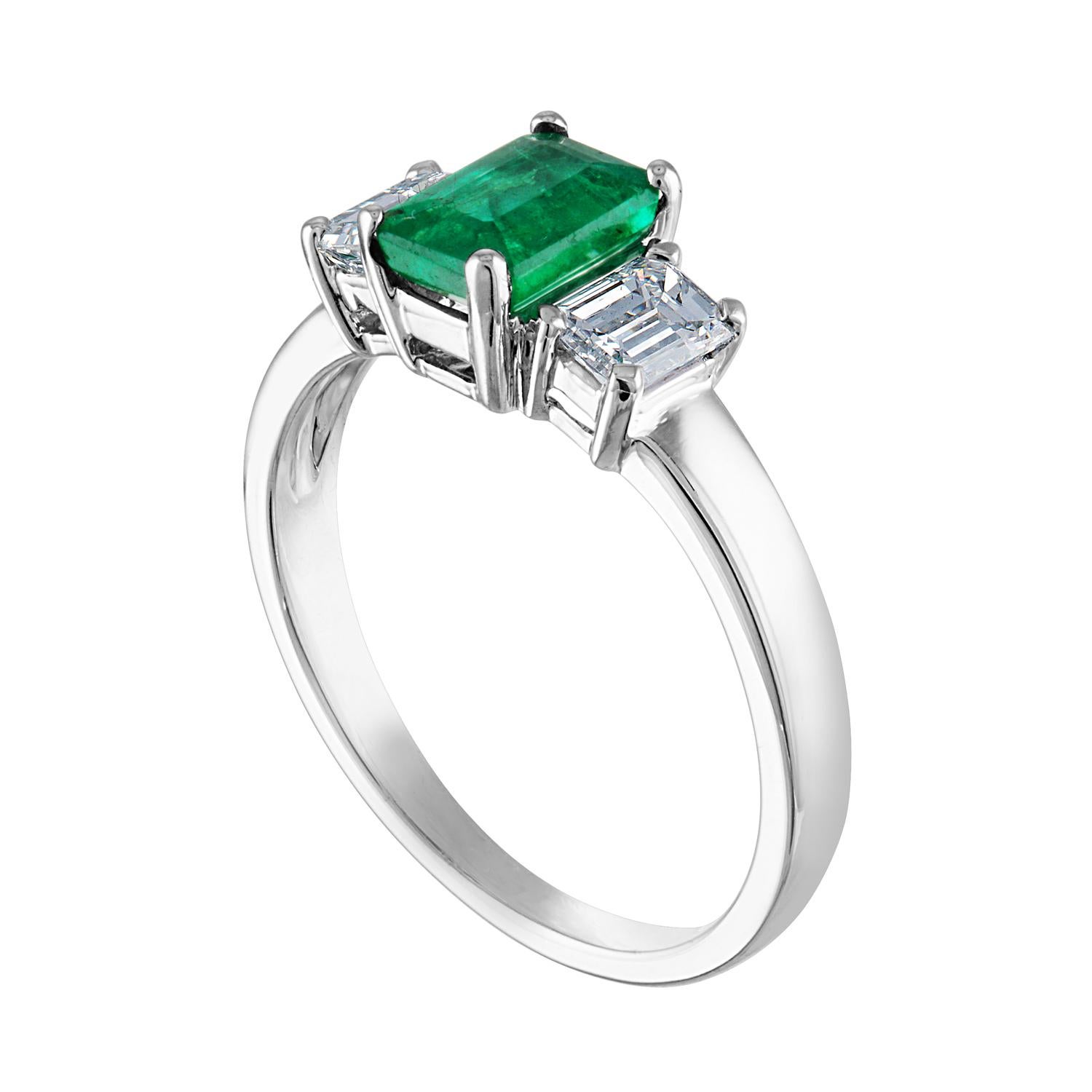 Beautiful 3 Stone Emerald Ring
The ring is 18K White Gold.
The Center is a beautiful emerald cut 0.84 Carat Emerald.
The Emerald is AGL certified.
There are 2 side stones 0.64 Carats Diamonds F/G VS/SI
The ring is a size 6.75, sizable.
The ring