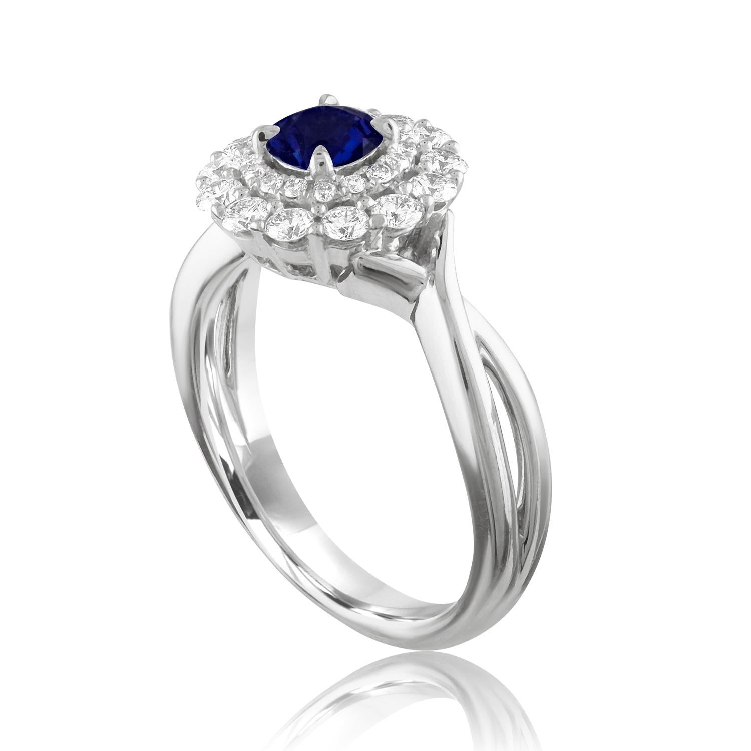 Beautiful Double Halo Ring
The ring is 18K White Gold
The Center Stone is a Round Blue Sapphire 0.84 Carats
The Sapphire is AGL Certified Heated
There are 0.52 Carats in Diamonds F/G VS/SI
The ring is a size 6.5, sizable.
The ring weighs 6.0 grams