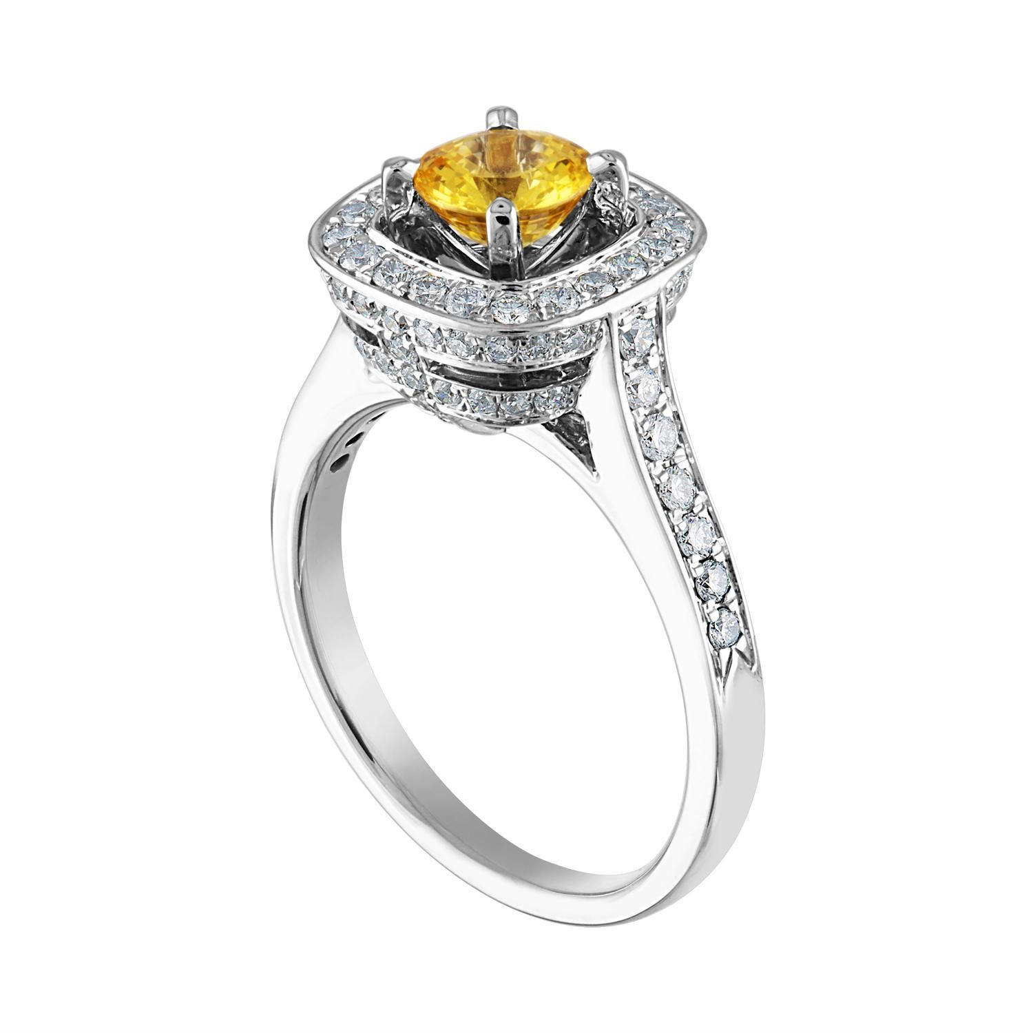 Beautiful Square Halo Ring
The ring is 18K White Gold
The Center Stone is a Round Yellow Sapphire 0.92 Carats
The Sapphire is AGL Certified Heated
There are 0.69 Carats in Diamonds F/G VS/SI
The ring is a size 7.25, sizable.
The ring weighs 6.2 grams