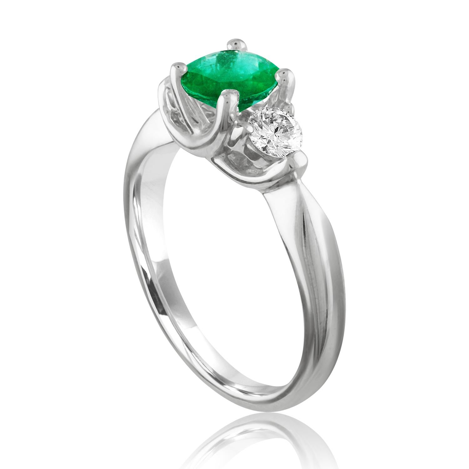 Beautiful 3 Stone Emerald Ring
The ring is 18K White Gold.
The Center is a beautiful Round 0.96 Carat Emerald.
The Emerald is AGL certified.
There are 2 side stones 0.37 Carats Diamonds F/G VS/SI
The ring is a size 6.50, sizable.
The ring weighs 4.6