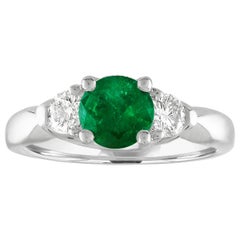 Anello d'oro con diamante a tre pietre e smeraldo certificato AGL da 0.96 carati