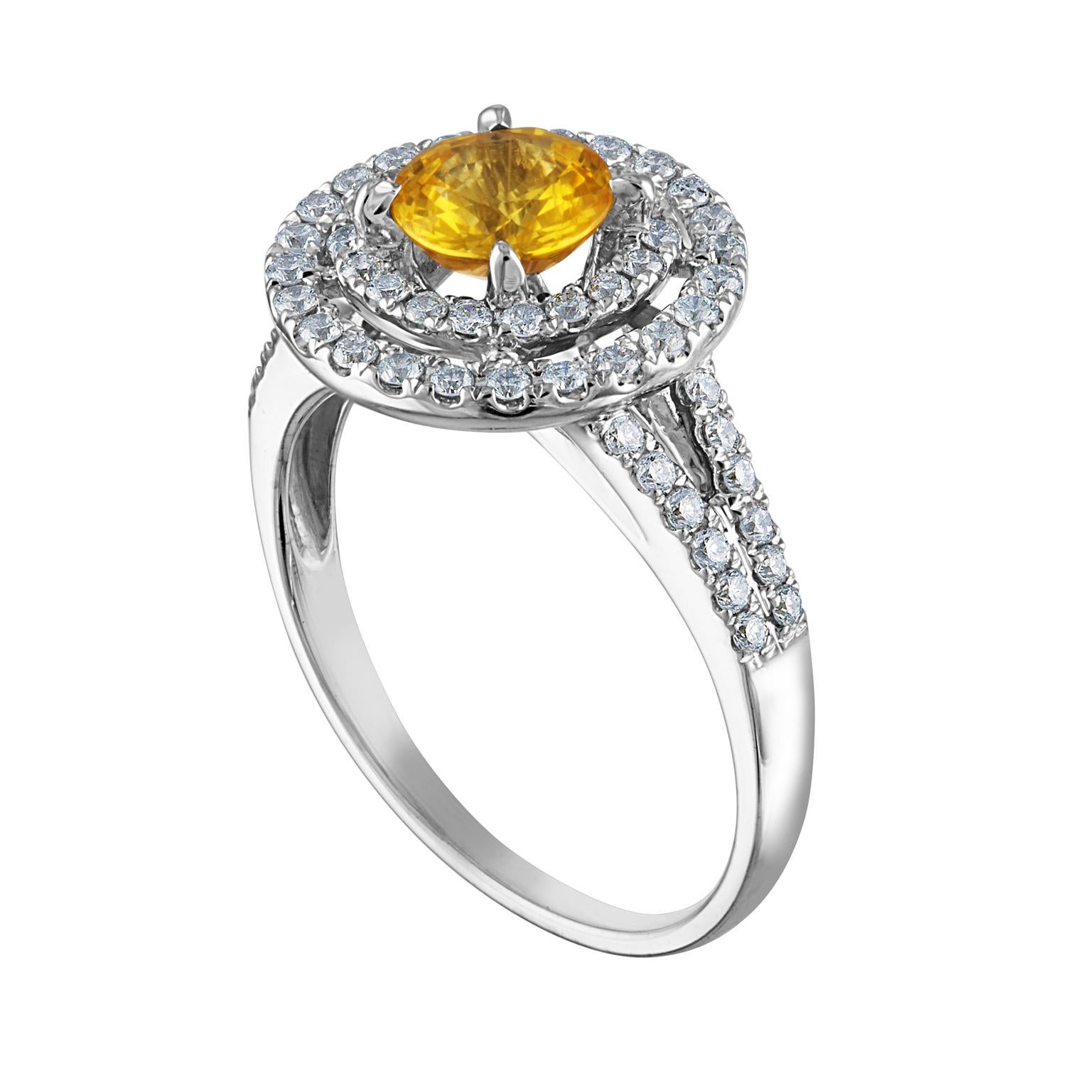 Beautiful Double Halo Ring
The ring is 14K White Gold
The Center Stone is a Round Yellow Sapphire 0.98 Carats
The Sapphire is AGL Certified Heated
There are 0.70 Carats in Diamonds F/G VS/SI
The ring is a size 6.5, sizable.
The ring weighs 4.0 grams