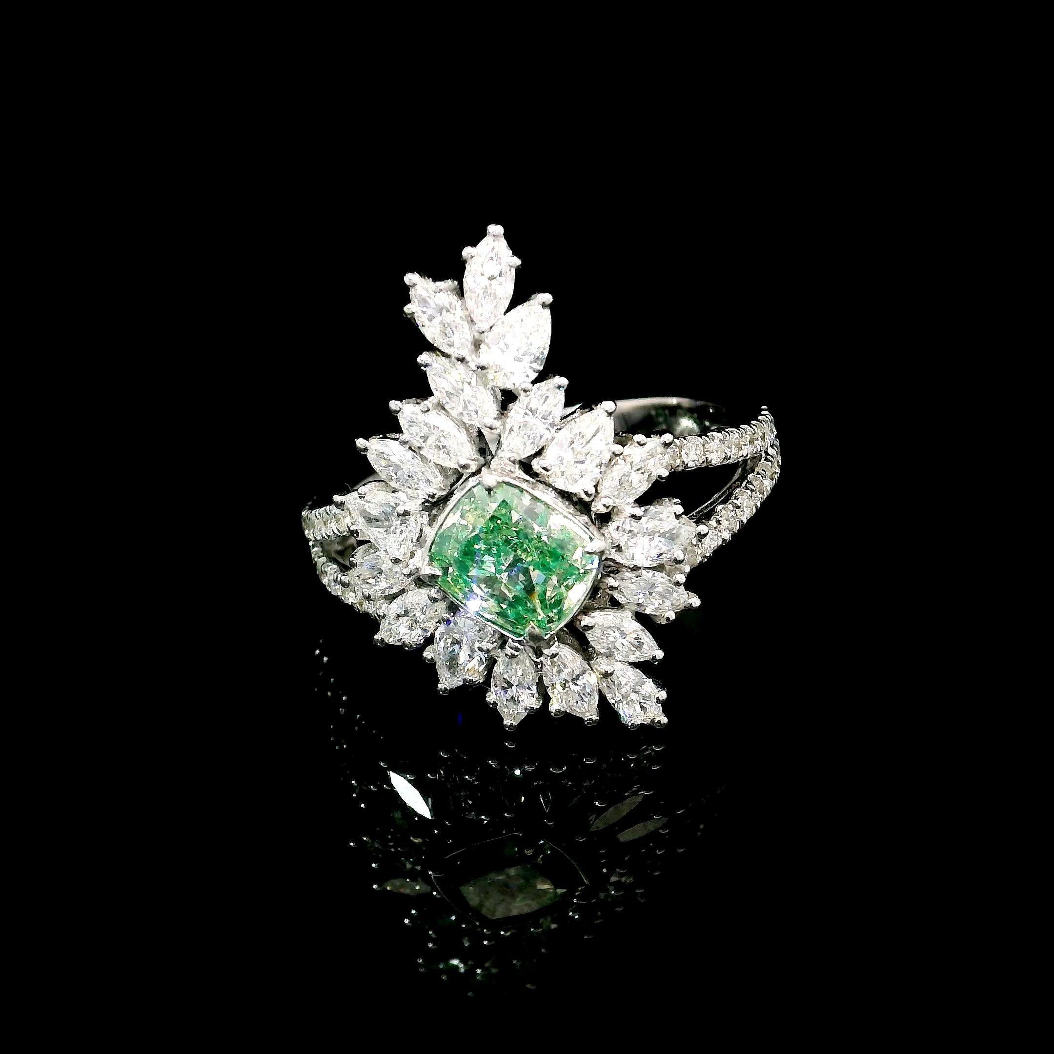 18kt white gold ring with diamonds
  
  Gold colour & karat: White gold 18kt
  Weight: 5.275 grams
  
  Set with-
  Stone type: Diamonds
  Shape: Cushion
  Carat: 1.00
  Colour: Fancy Green
  Clarity: SI
  
  Surrounding Stones: Diamonds
 1) White
