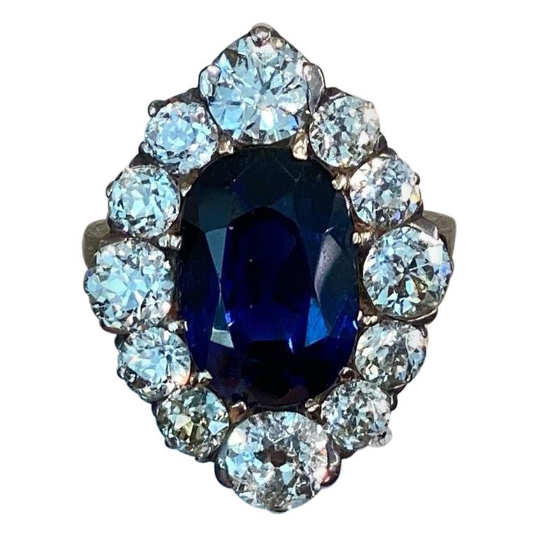 AGL Certified 10.04 Carat Ceylon Blue Oval Sapphire Diamond Ring