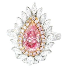 Anillo de diamantes con certificado AGL de 1.01 quilates de color rosa fantasía y claridad SI