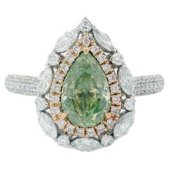 Anello con diamante certificato AGL da 1.02 carati, di colore verde Greene & Greene