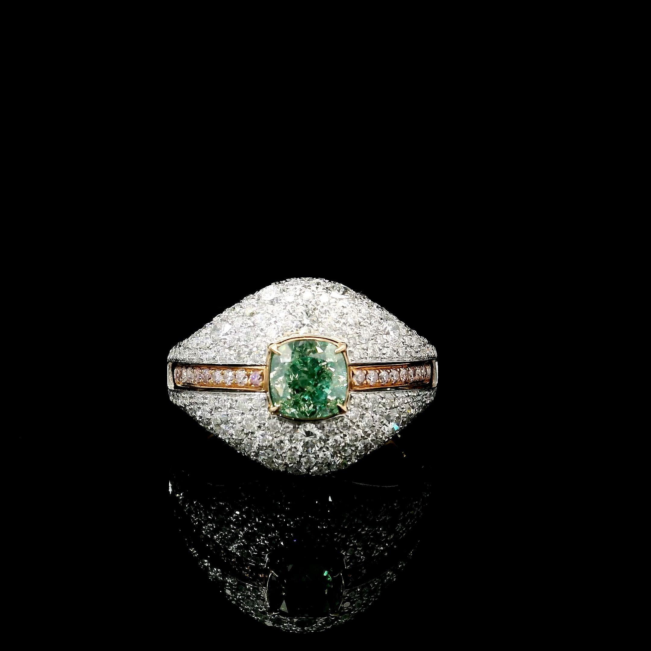 18kt white gold ring with diamonds
  
  Gold colour & karat: White gold 18kt
  Weight: 6.715 grams
  
  Set with-
  Stone type: Diamonds
  Shape: Cushion
  Carat: 1.02
  Colour: Fancy Green  
  Clarity: VS
  
  Surrounding Stones: Diamonds
 1) White