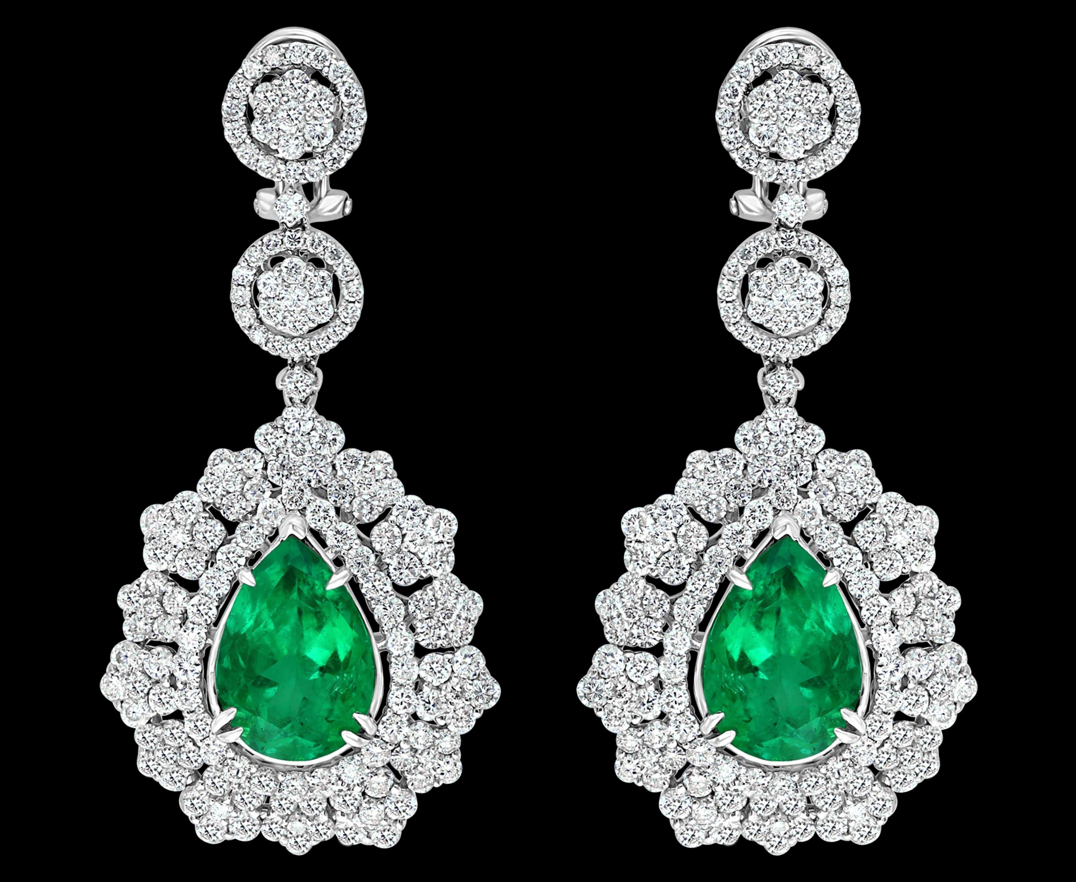 AGL Certified 11 Ct Pear/Drop Colombian Emerald 9 Ct Diamond Earrings 18K Gold
These Earrings are with  Perfect pair of matching emeralds  and Diamond  
This exquisite pair of earrings are beautifully crafted with 18 karat white gold  weighing  18