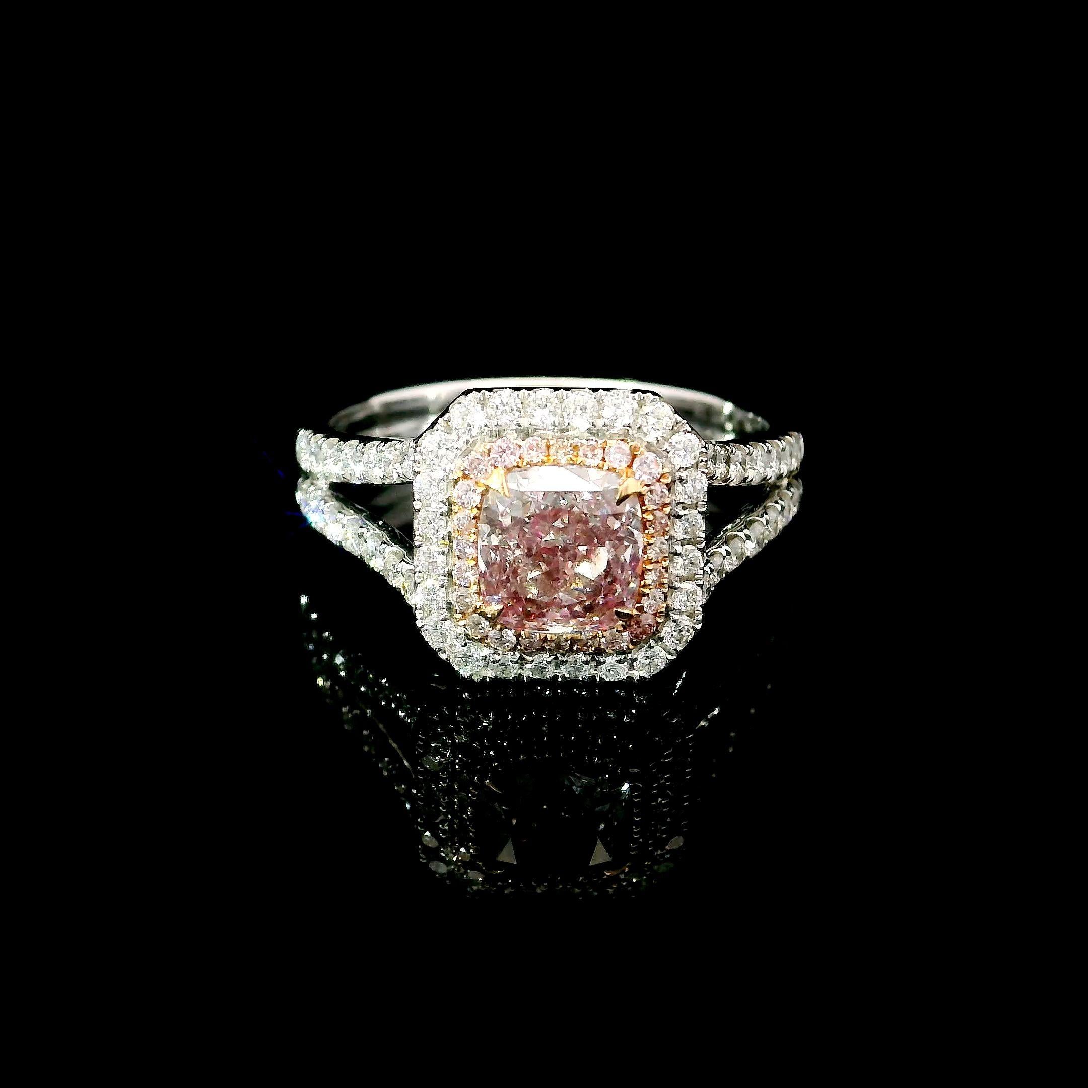 18kt white gold ring with diamonds
  
  Gold colour & karat: White gold 18kt
  Weight: 4.267 grams
  
  Set with-
  Stone type: Diamonds
  Shape: Round
  Carat: 1.10
  Colour: Fancy Pink  
  Clarity: VS
  
  Surrounding Stones: Diamonds
 1) White