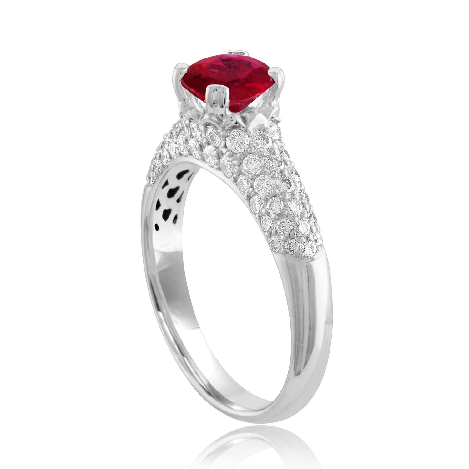 Beautiful Pave Ring
The ring is 18K White Gold
The Center Stone is a Round Ruby 1.14 Carats
The Ruby is AGL Certified Heated
There are 0.77 Carats in Diamonds F/G VS/SI
The ring is a size 6.75, sizable.
The ring weighs 4.2 grams