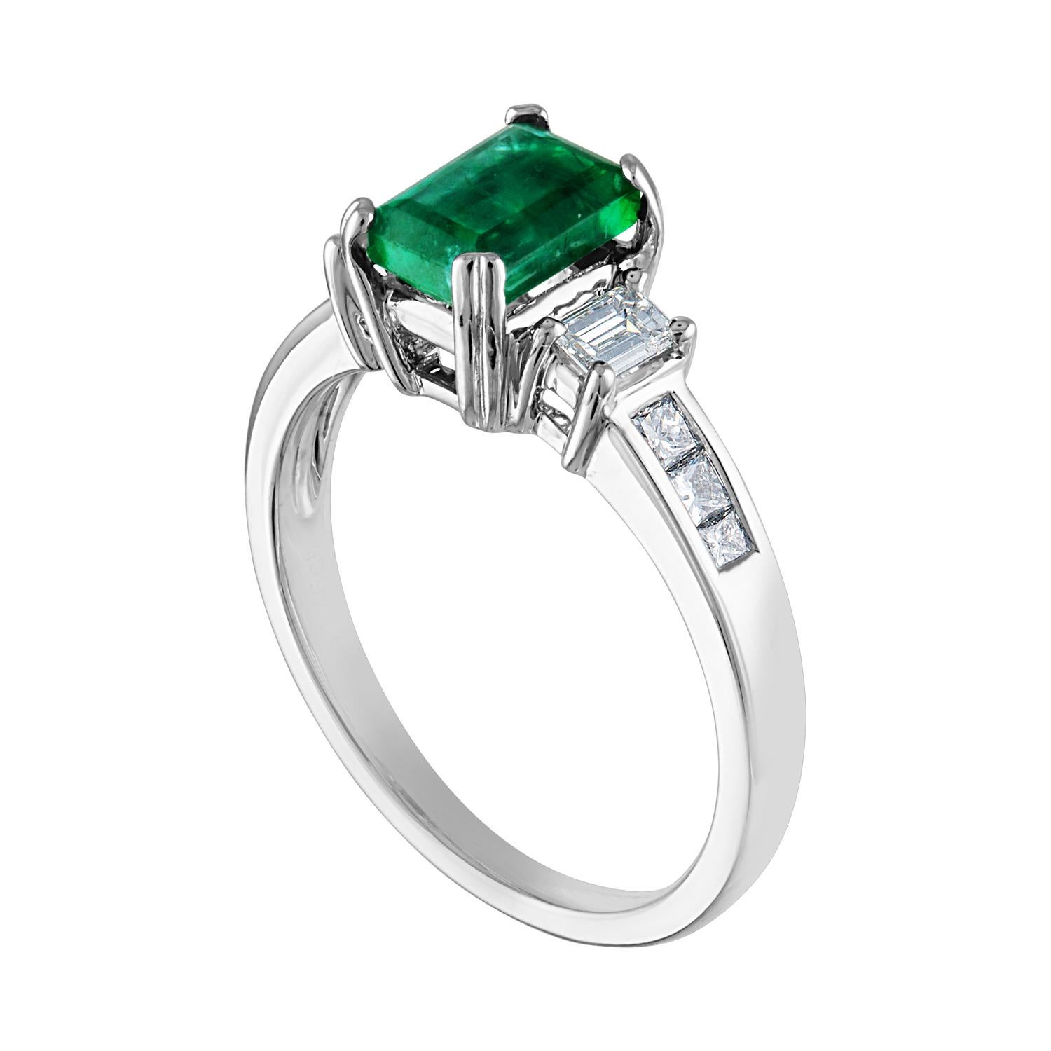 Beautiful 3 Stone Emerald Ring
The ring is 18K White Gold.
The Center is a beautiful emerald cut 1.15 Carat Emerald.
The Emerald is AGL certified.
There are 0.46 Carats Diamonds F/G VS/SI
The ring is a size 7.00, sizable.
The ring weighs 4.1 grams.
