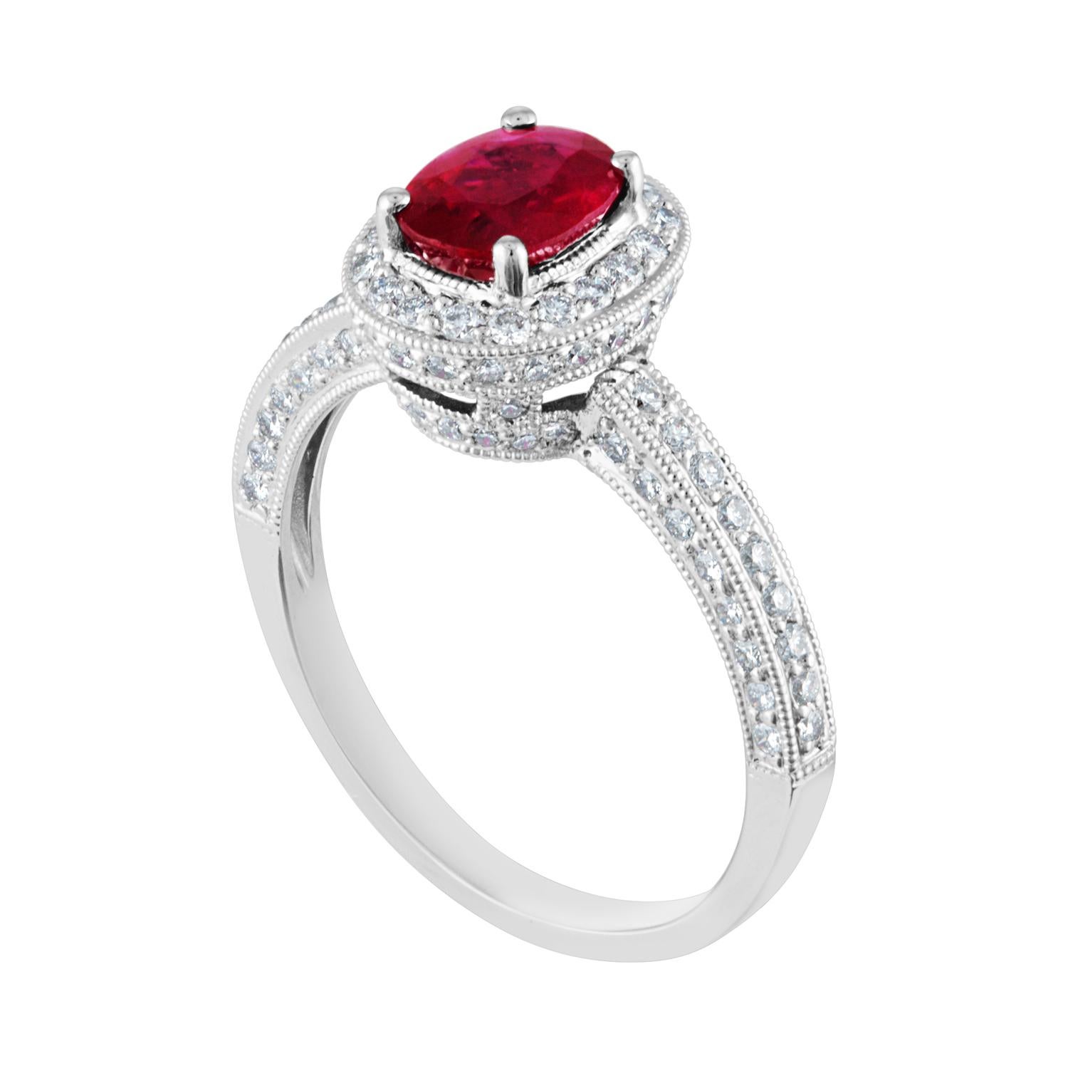 Oval Halo Milgrain Engagement Ring
The ring is 18K White Gold
The oval Burma ruby is 1.29 Carats
There are 0.75 Carats In Diamonds G/H SI
The ring weighs 4.2 grams
The ring is a size 8.0, sizable