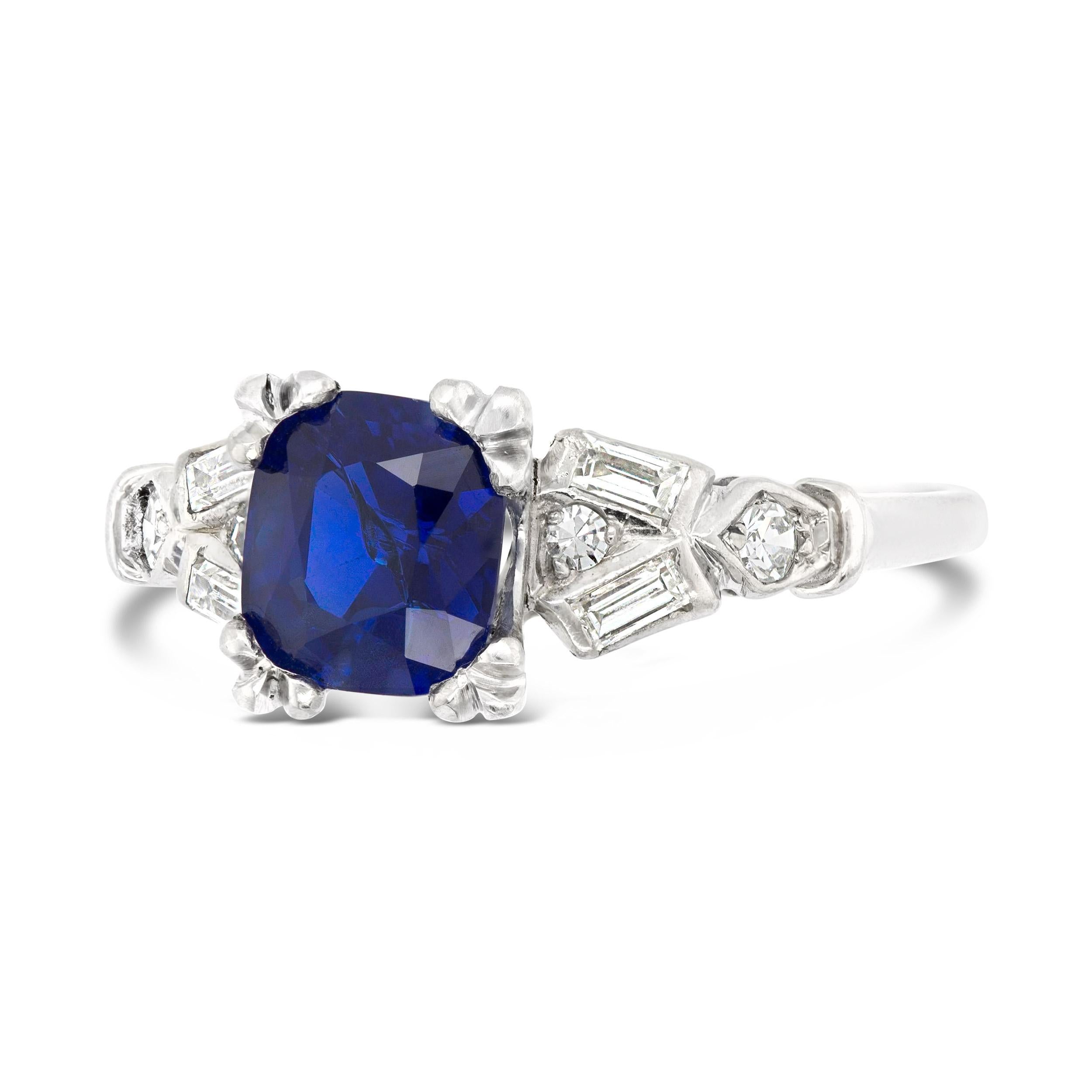 So delicate, so elegant. Kashmir sapphires are some of the most sought after, for their rarity and quality. An incredibly beautiful deep blue cushion cut sapphire from the Kashmir region (graded by AGL) sits in this original Art Deco setting. It