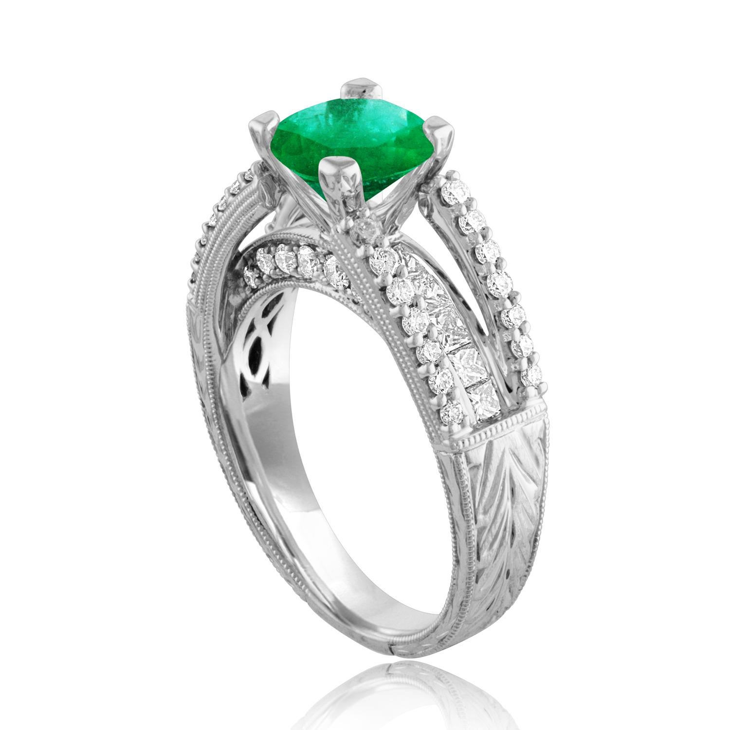 Beautiful Art Deco Revival Round Milgrain Filigree Ring
The ring is 18K White Gold
The Center Stone is a Round Emeralds 1.30 Carats
The Emerald is AGL Certified Heated
There are 0.95 Carats in Diamonds F/G VS/SI
The ring is a size 6.75, sizable.
The