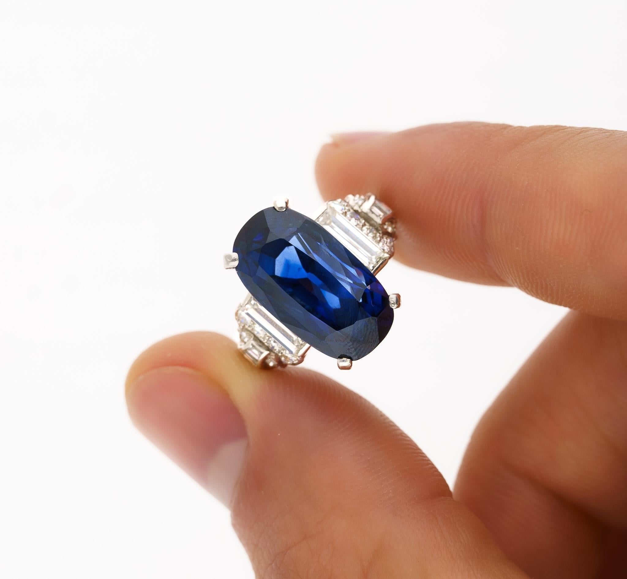 AGL Certified 13.81 Carat Oval Cut Ceylon No Heat Blue Sapphire and Diamond Vintage Platinum Ring. 

Item Details:
Type: Cocktail Ring 
Metal: Platinum 
Weight: 8.90 grams 
Setting: Prong 
_______________________
Center Stone Details:
Type: Sapphire