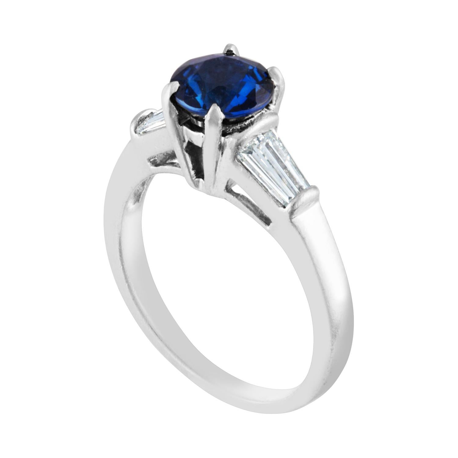 Beautiful Blue Sapphire Ring.
The ring is Platinum.
The Blue Sapphire is Round 1.41 Carat.
The stone is AGL Certified,
The stone is Heated.
There are 0.40 Carat Diamonds F VS
The ring is a size 6.00, sizable.
The ring weighs 6.20 grams