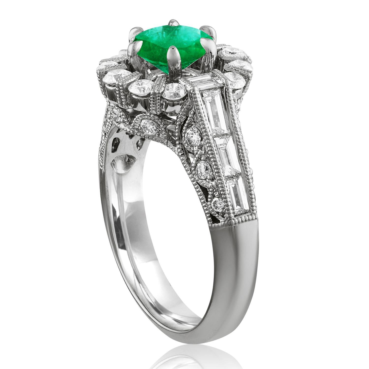 Beautiful Halo Emerald Milgrain Ring
The ring is 18K White Gold.
The Center is a beautiful round cut 1.48 Carat Emerald.
The Emerald is AGL certified.
There are 1.30 Carats in Diamonds F/G VS/SI
The ring is a size 6.50, sizable.
The ring weighs 6.6