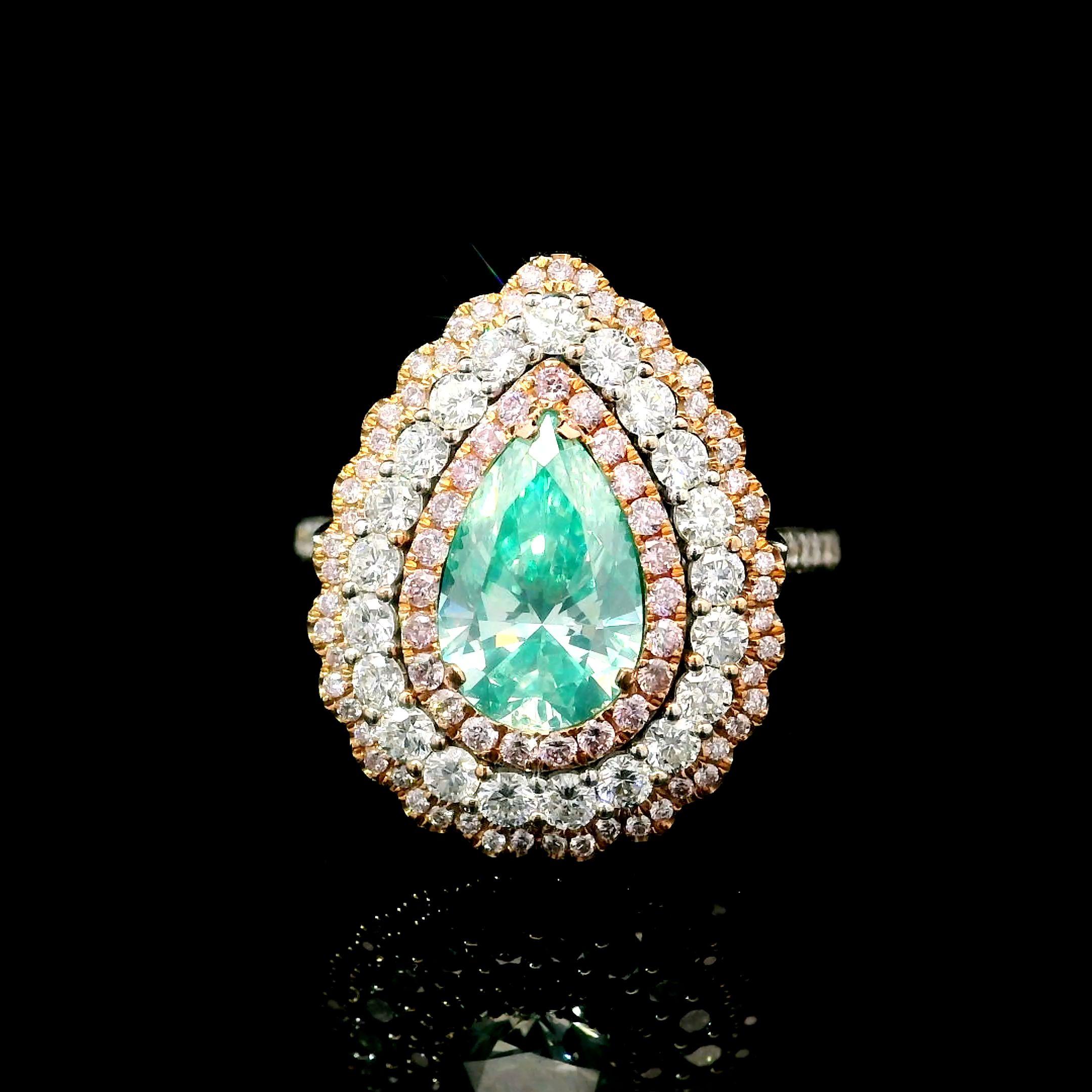 18kt white gold ring with diamonds

  Gold colour & karat: White gold 18kt
  Weight: 6.92 grams
  
  Set with-
  Stone type: Diamonds
  Shape: Pear
  Carat: 1.50 ct
  Colour: Fancy Green
  Clarity: SI
  
  Surrounding Stones: Diamonds
 1) White