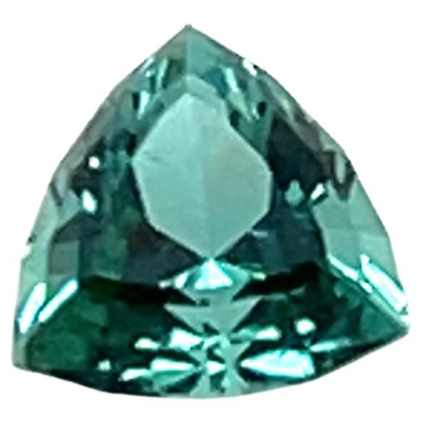This AGL certified loose 1.50-carat triangle-cut blue-green tourmaline measures 7.52 x 7.55 x 5.12mm.  Known for its brilliance and durability, tourmaline is a sought-after gemstone, perfect for custom jewelry. Whether set in a ring or pendant, this