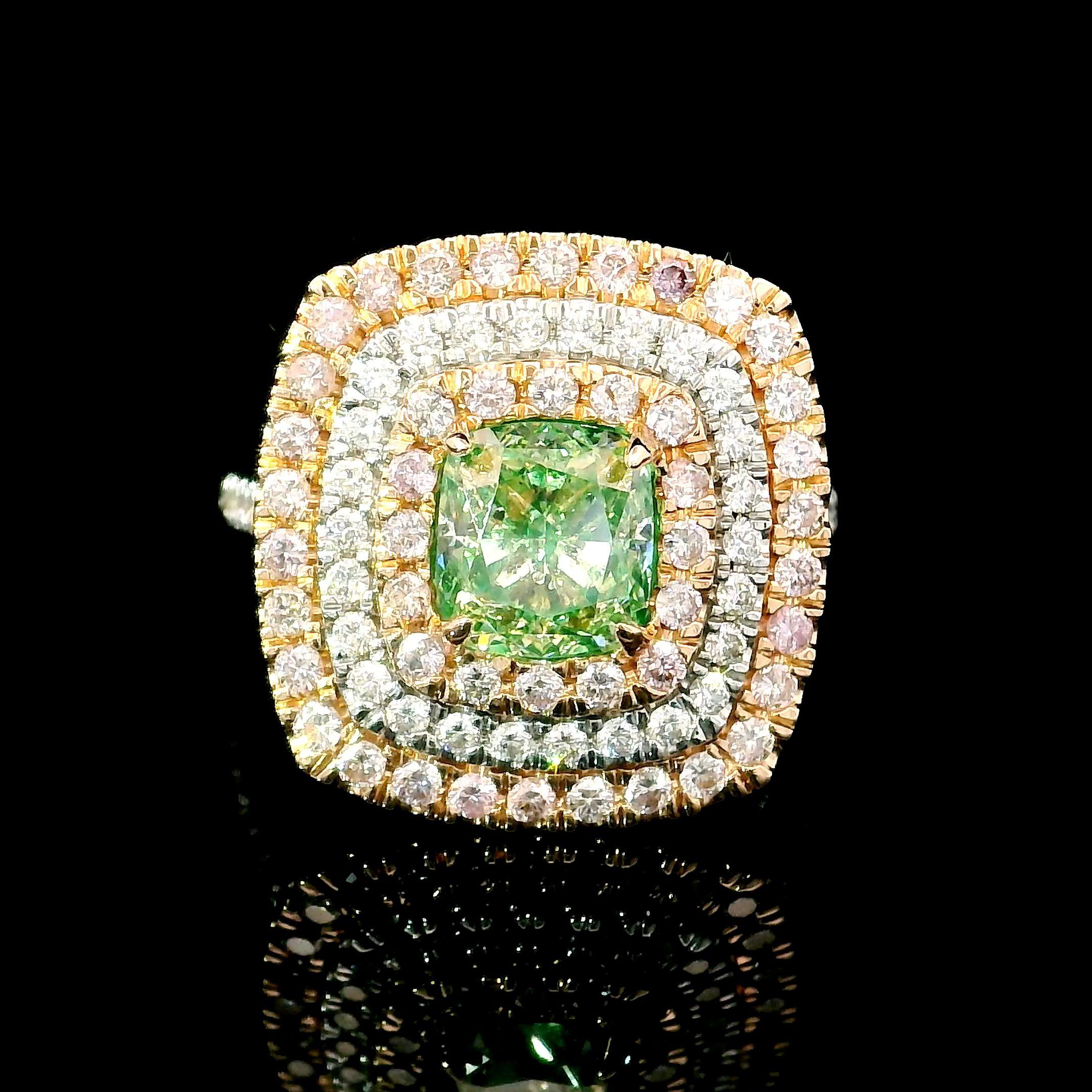 18kt white gold ring with diamonds
  
  Gold colour & karat: White gold 18kt
  Weight: 6.79 grams
  
  Set with-
  Stone type: Diamonds
  Shape: Cushion
  Carat: 1.51 ct
  Colour: Fancy Green
  Clarity: VS
  
  Surrounding Stones: Diamonds
 1) White