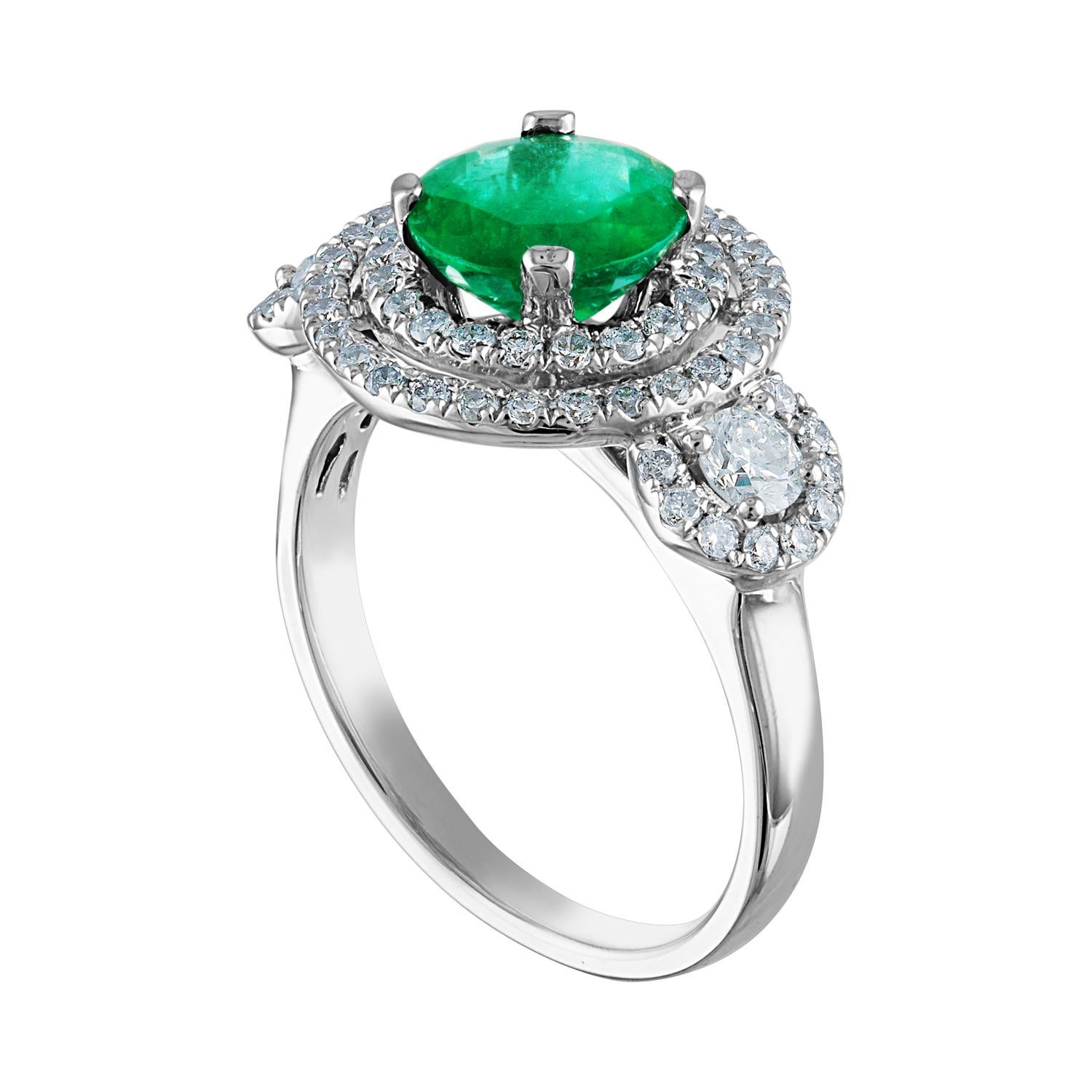 Beautiful Double Halo Emerald Ring
The ring is 18K White Gold.
The Center is a beautiful round cut 1.51 Carat Emerald.
The Emerald is AGL certified.
There are 0.82 Carats in Diamonds F/G VS/SI
The ring is a size 7.00, sizable.
The ring weighs 5.7