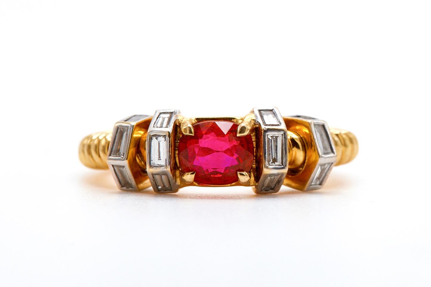 18K YELLOW GOLD 
18 DIAMONDS |  0. 69 CARATS
1 BURMA NO HEAT RUBY | 1.54 CARATS 
AGL CERTIFIED

Introducing the Ruby Screw Ring, a captivating piece that seamlessly combines classic beauty with a touch of contemporary flair. This exquisite ring is