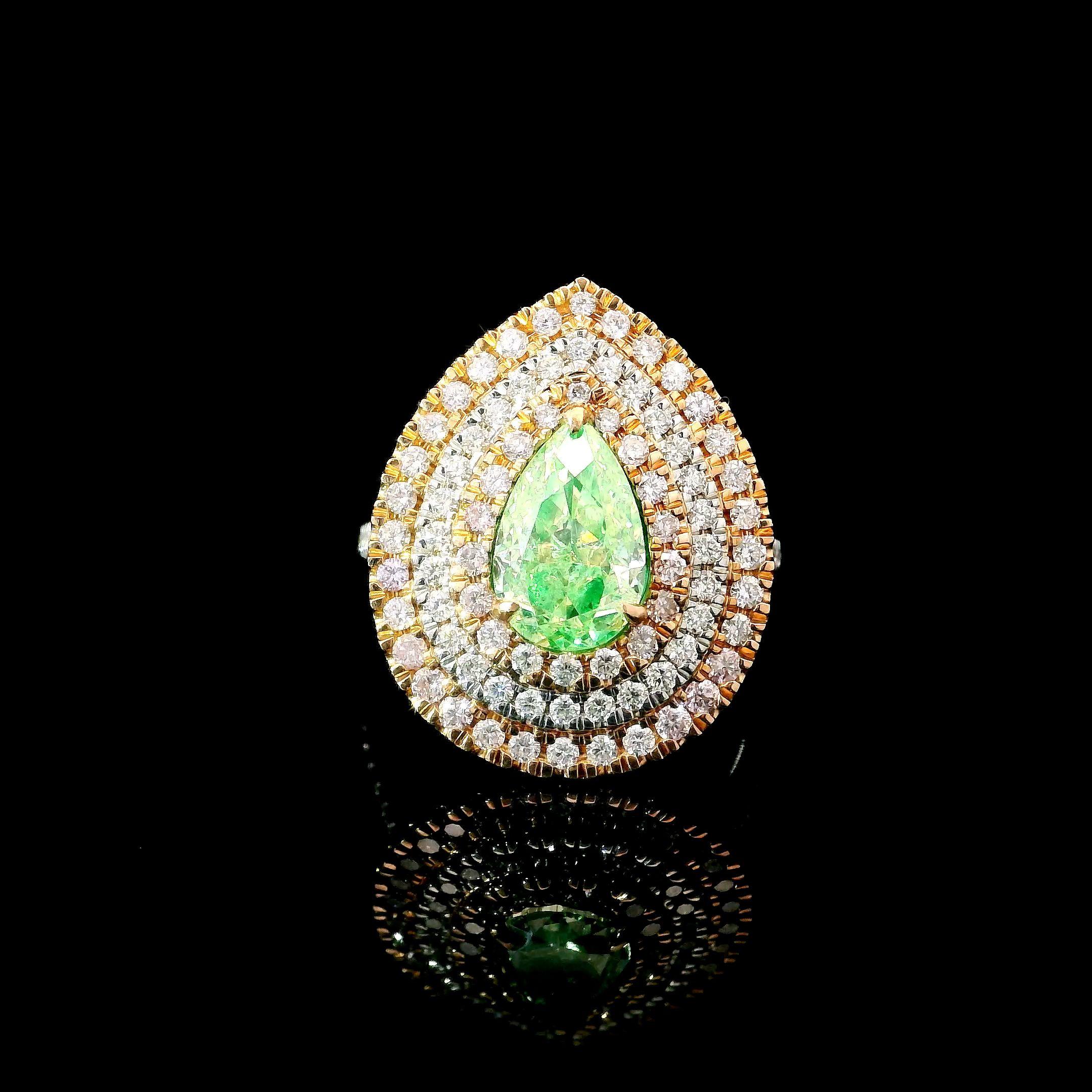 18kt white gold ring with diamonds
  
  Gold colour & Carat: White gold 18kt
  Weight: 6.778 grams
  
  Set with-
  Stone type: Diamonds
  Shape: Pear
  Carat: 1.56 ct
  Colour: Fancy Green
  Clarity: VS
  
  Surrounding Stones: Diamonds
 1) White