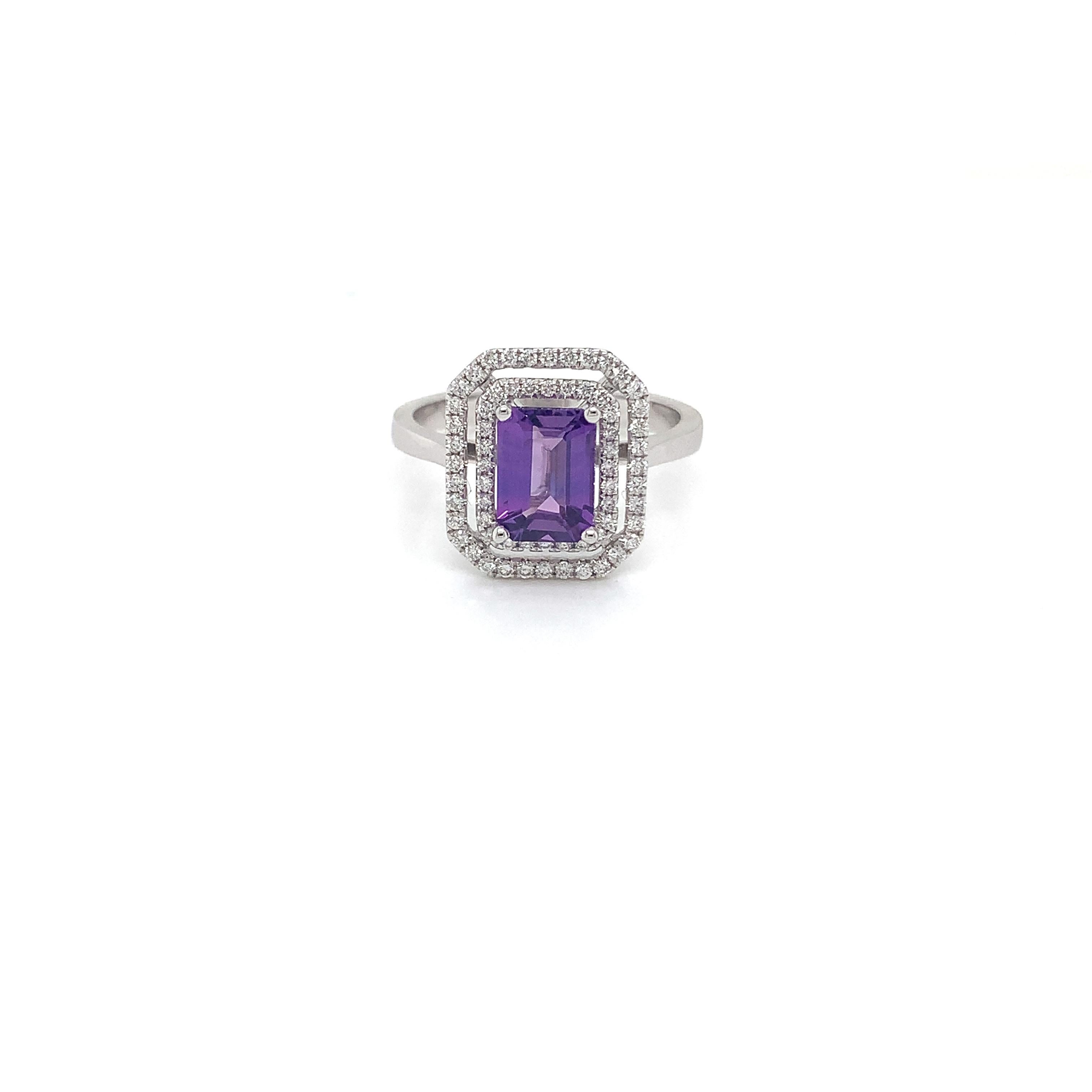 No Heat AGL Certified emerald cut puple sapphire weighing 1.61 cts.
Measuring (7.8x5.6) mm
6f pieces of diamonds weighing .29 cts
Set in 14k white gold ring