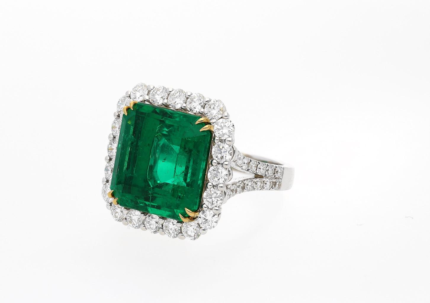 Emerald Cut AGL Certified 16.46 Carat Vivid Green Colombian Emerald and Diamond Halo Ring For Sale