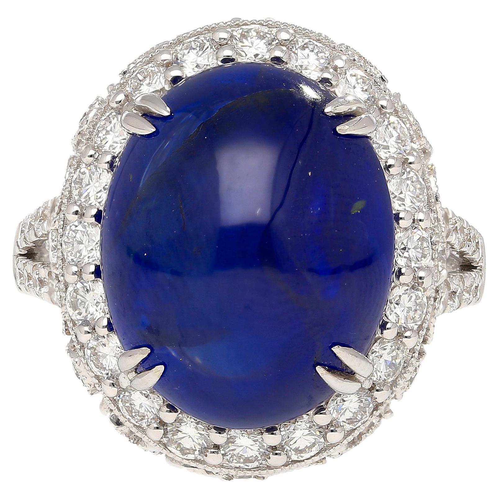 AGL Certified 16.68 Carat Cabochon Ceylon Blue Sapphire Ring with Diamond Halo For Sale