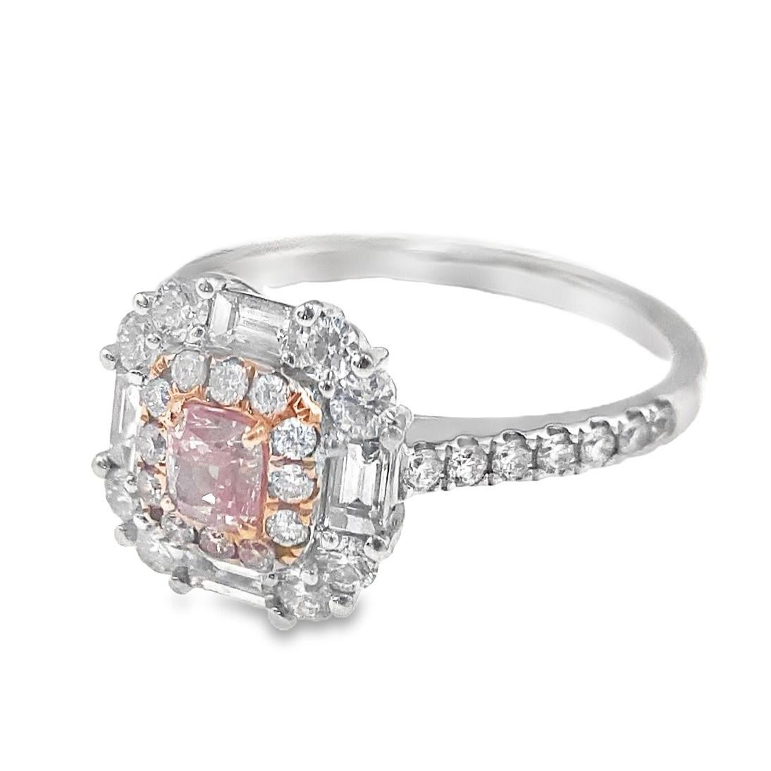 AGL Certified Fancy Pink Diamond - 0.32 CT
Diamonds - 0.75 CT
18K White Gold - 3.52 GM

Fashion Ring & Engagement Ring & Lovers' Gift

The pink diamond is a captivating and rare gemstone, its hue evoking the most delicate and precious things in