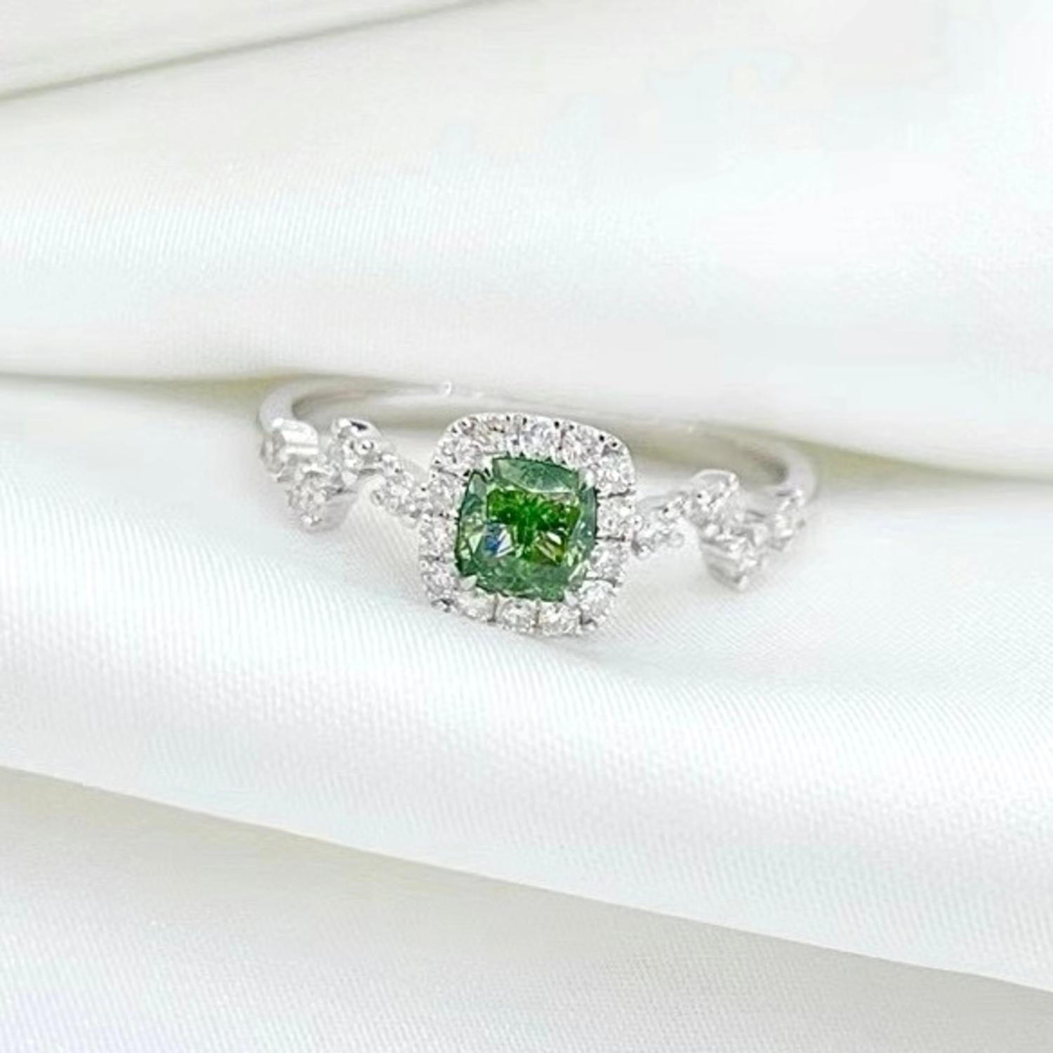 18K White Gold Fancy Green Cushion-Cut Diamond Engagement Ring

1 Fancy Green Diamond - 0.60 CT
Cushion Cut / AGL Certified
Diamonds - 0.25 CT
Total Weight - 2.41 GM
