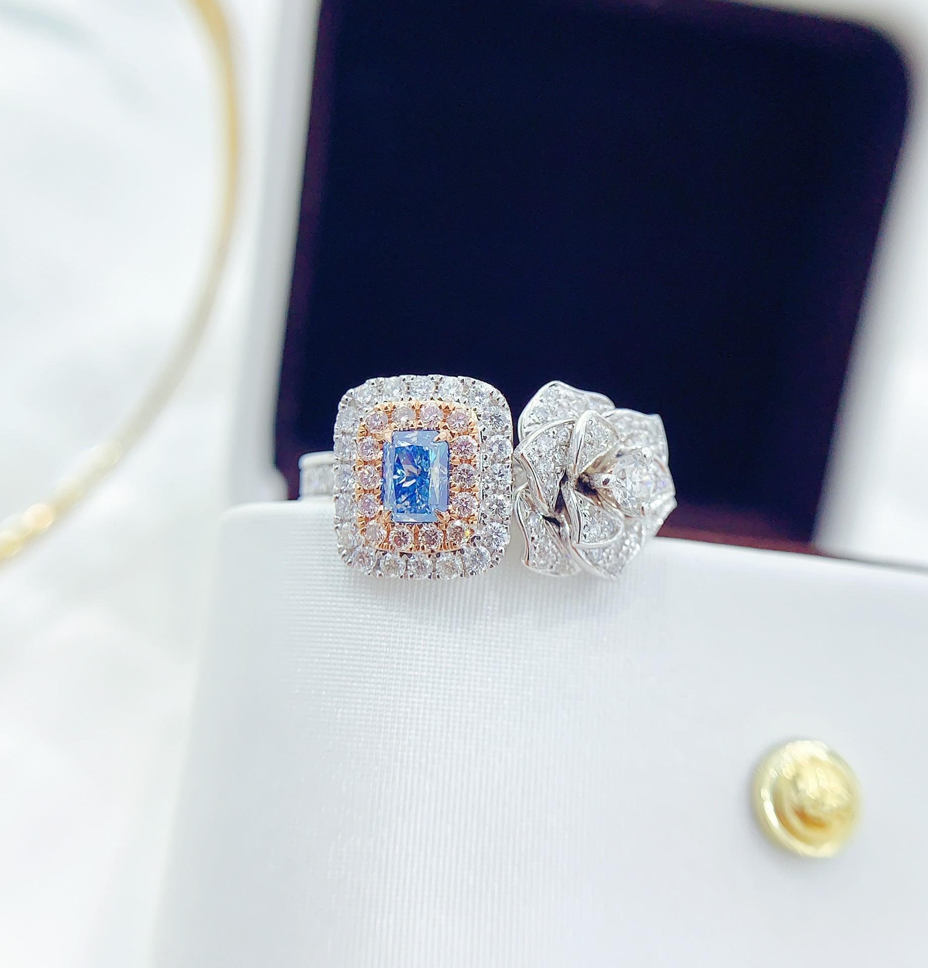 AGL Certified 18K White Gold Fancy Blue Diamond Cocktail Ring 

Blue Diamond - 0.42 CT
Diamonds - 0.82 CT

Total Weight - 6.49 GM

AGL Certification Attached 
