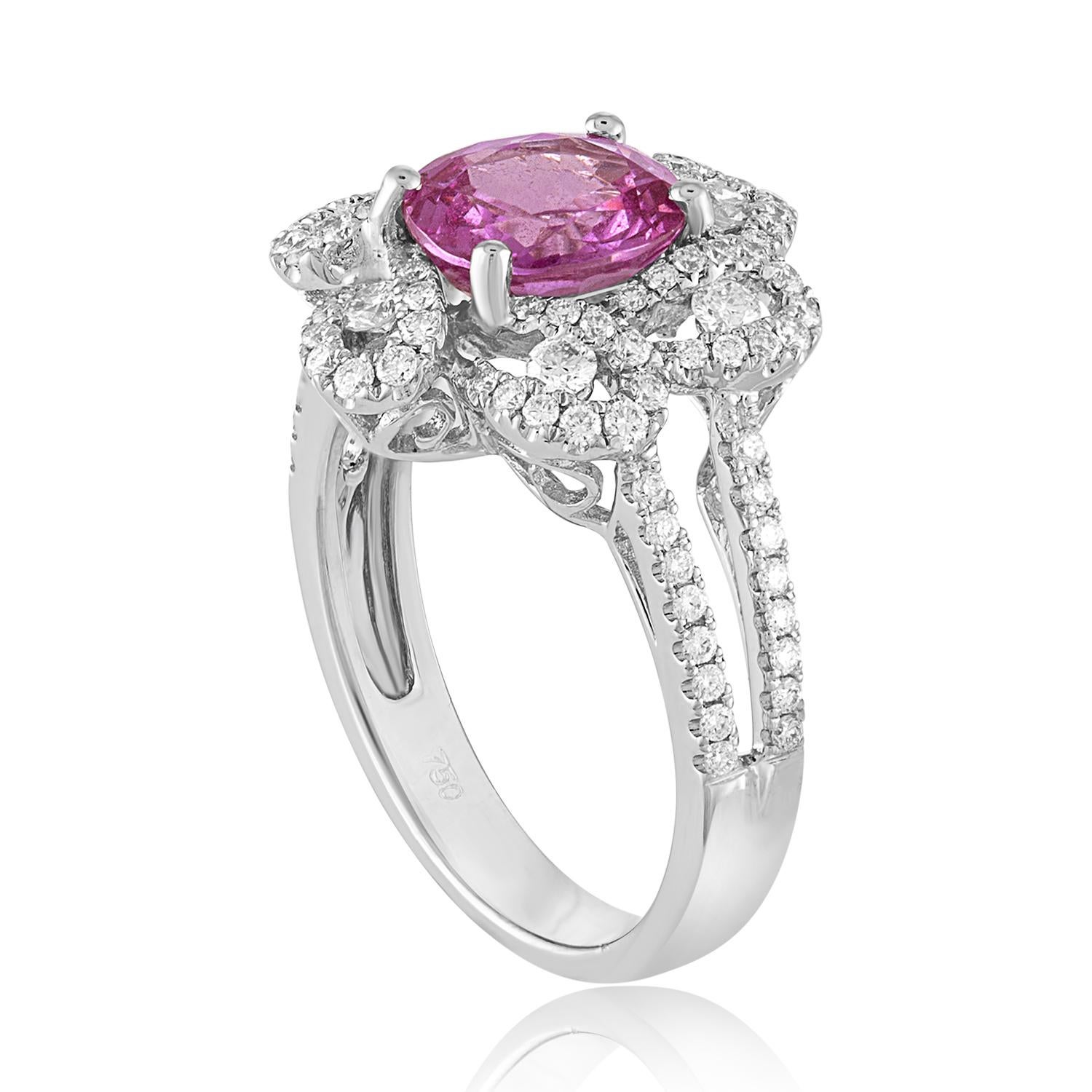 Beautiful Flower Ring
The ring is 18K White Gold
The Center Stone is a Pink Cushion Sapphire 1.90 Carat HEATED
The Sapphire is AGL Certified
There are 0.59 Carats in Diamonds F VS
The top of the ring measures 15.72mm wide
The ring is a size 5.75,