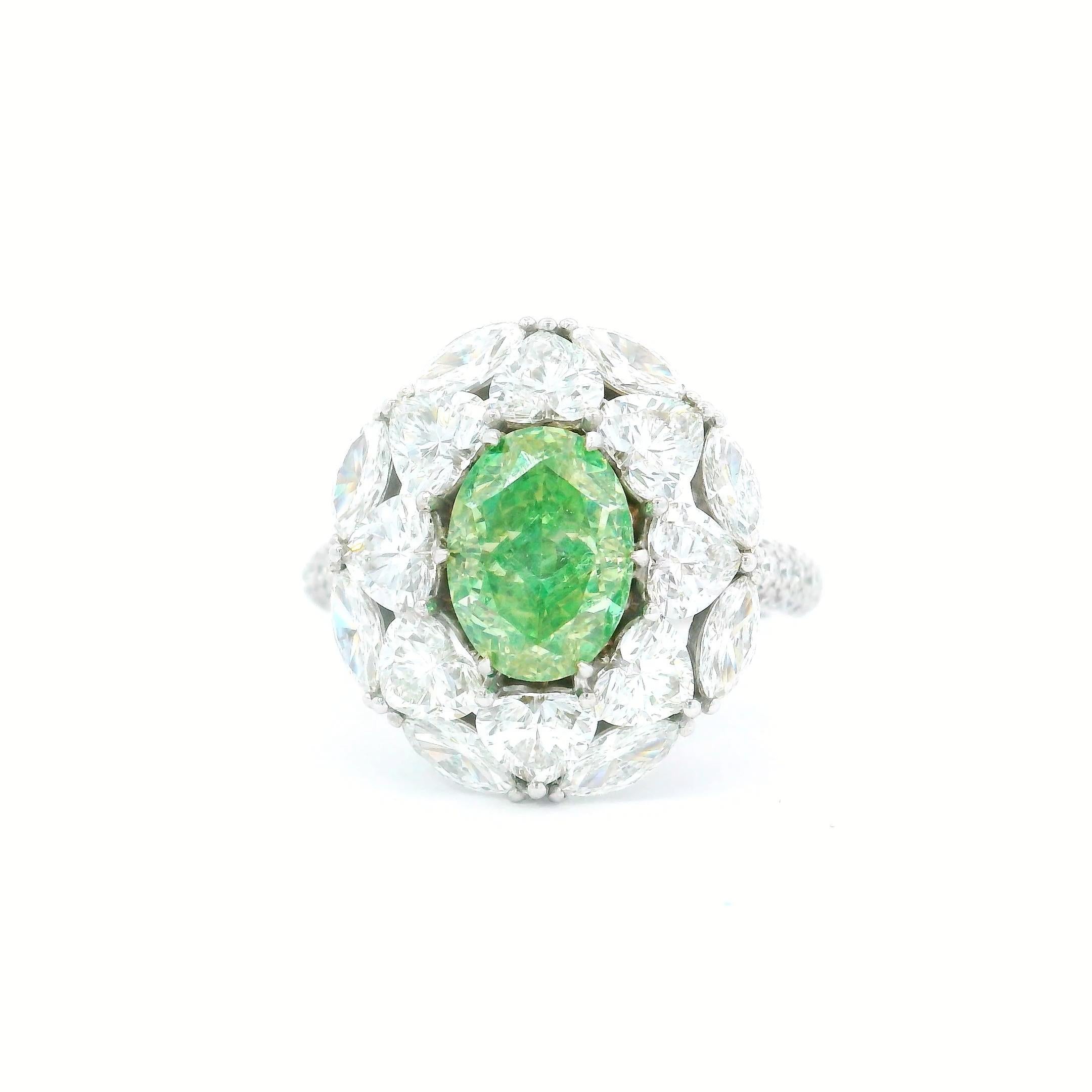 18kt white gold ring with diamonds
  
  Gold colour & karat: White gold 18kt
  Weight: 06.30 grams
  
  Set with-
  Stone type: Diamonds
  Shape: Oval
  Carat: 2.00 ct
  Colour: Fancy Green
  Clarity: VS
  
  Surrounding Stones: Diamonds
 1) White