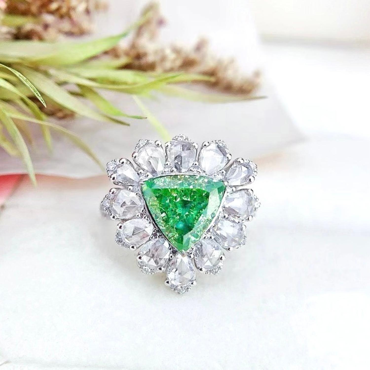 AGL Certified VS Clarity Trillion-Cut Fancy Green Green 2.02 CT Diamond Ring

1 Fancy Green Diamond 
Trillion Cut / VS Clarity / AGL Certified

Rose Cut Diamonds - 1.27 CT
Total Weight - 6.69 GM
