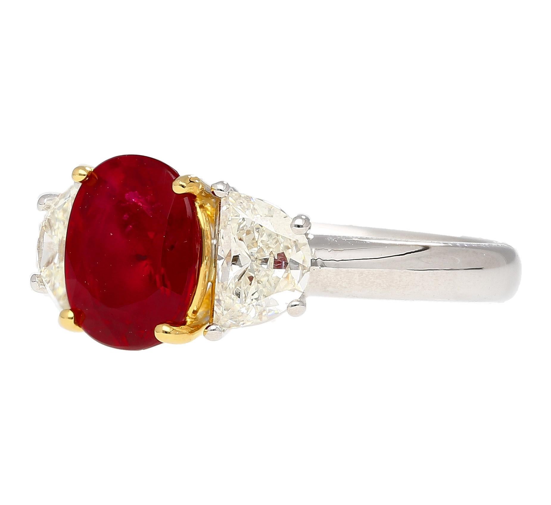 AGL Certified 2.19 carat no heat Burma ruby ring. Adorned with 2 trapezoid cut diamonds totaling 0.97 cttw. The gemstones are set in prong setting; ruby is set in 18k yellow gold and the diamonds are set in 18k white gold. 

Details: 
✔ Item Type: