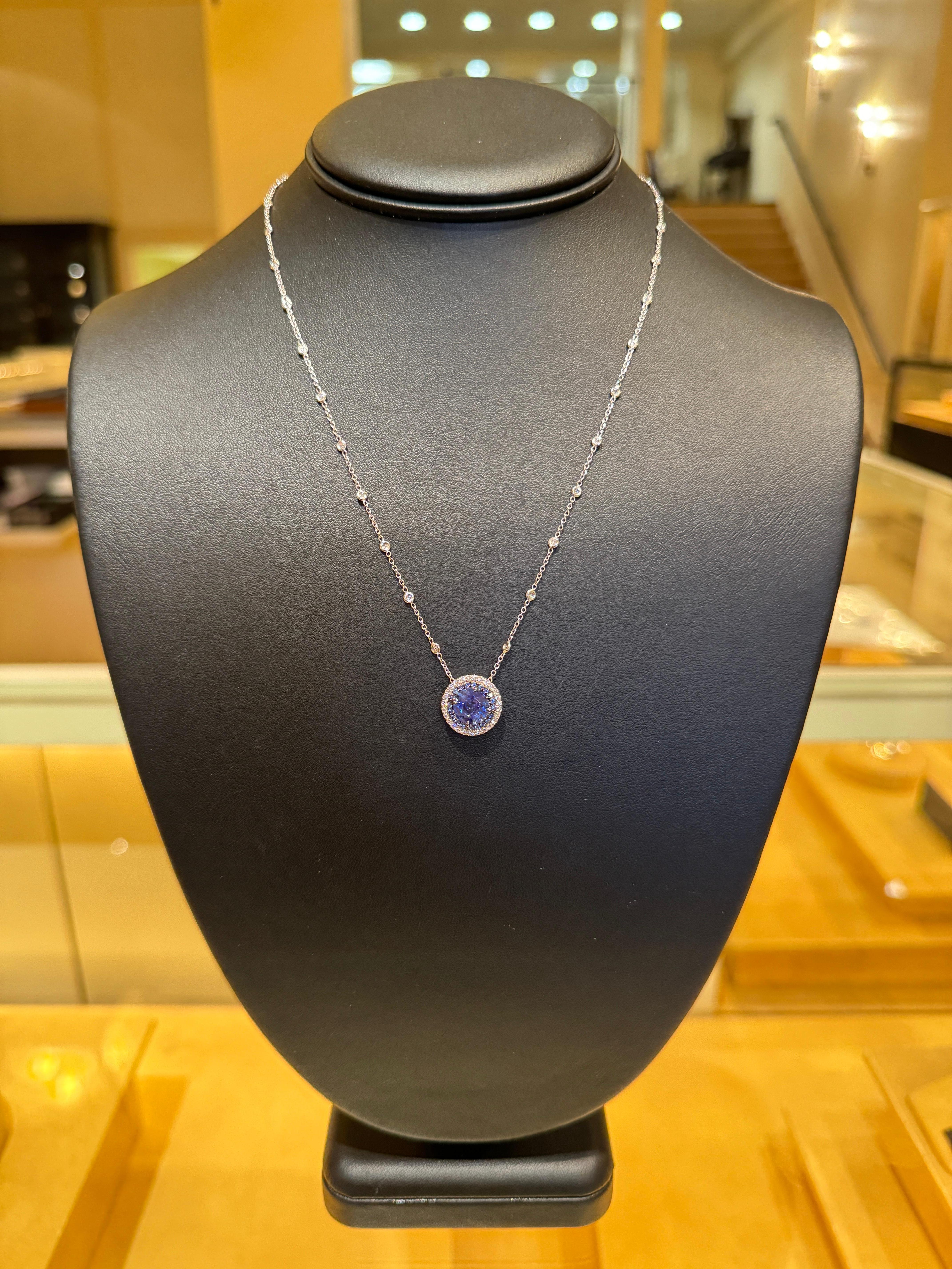 No Heat Ceylon Blue Sapphire Pendant containing 2.24ct center stone surrounded by 0.28ct sapphire halo and 0.26ct diamond halo set in 18k white gold with 18k white gold and diamond 18