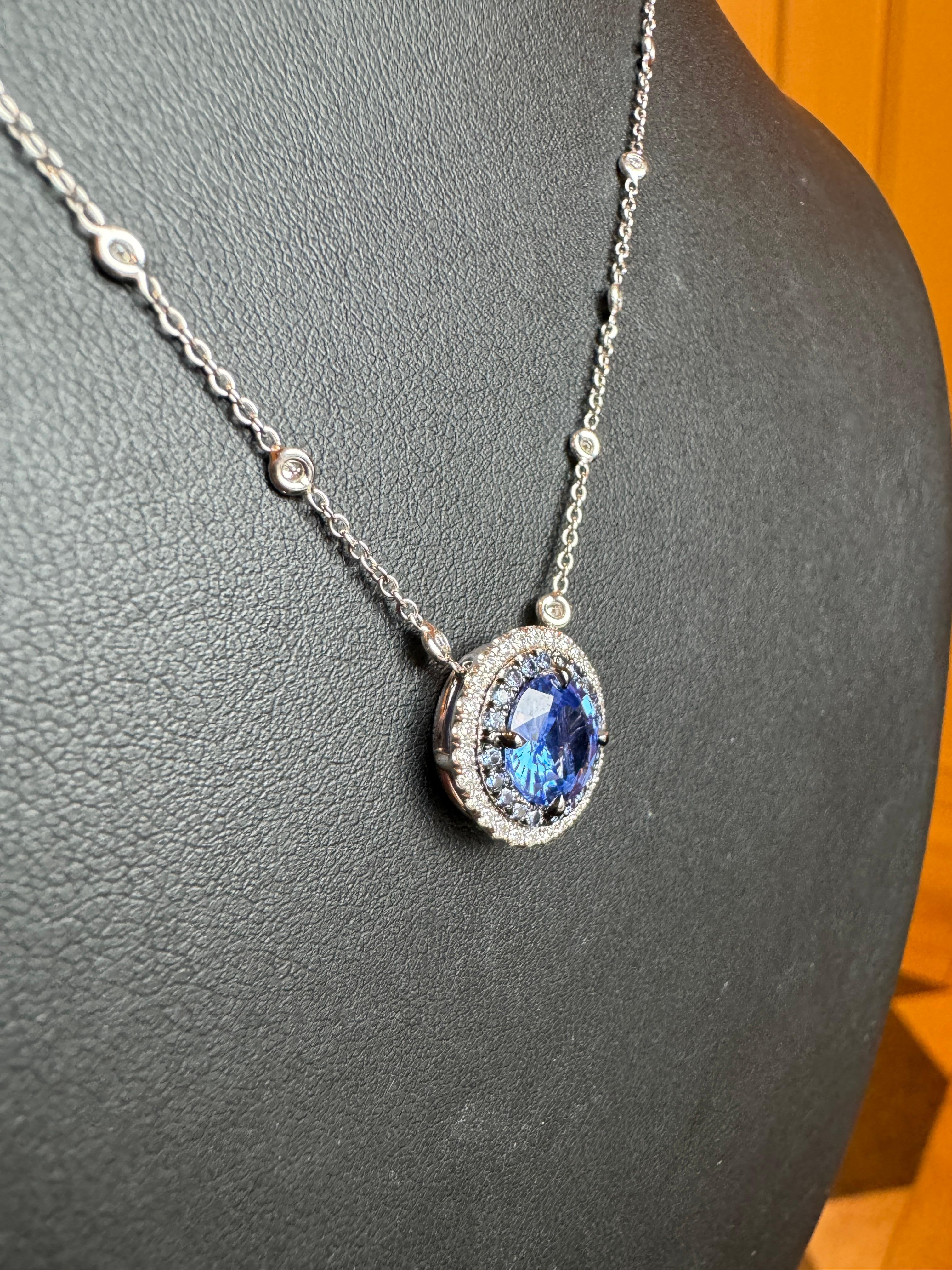 Contemporary AGL Certified 2.24ct Sapphire and Diamond Double Halo Pendant For Sale