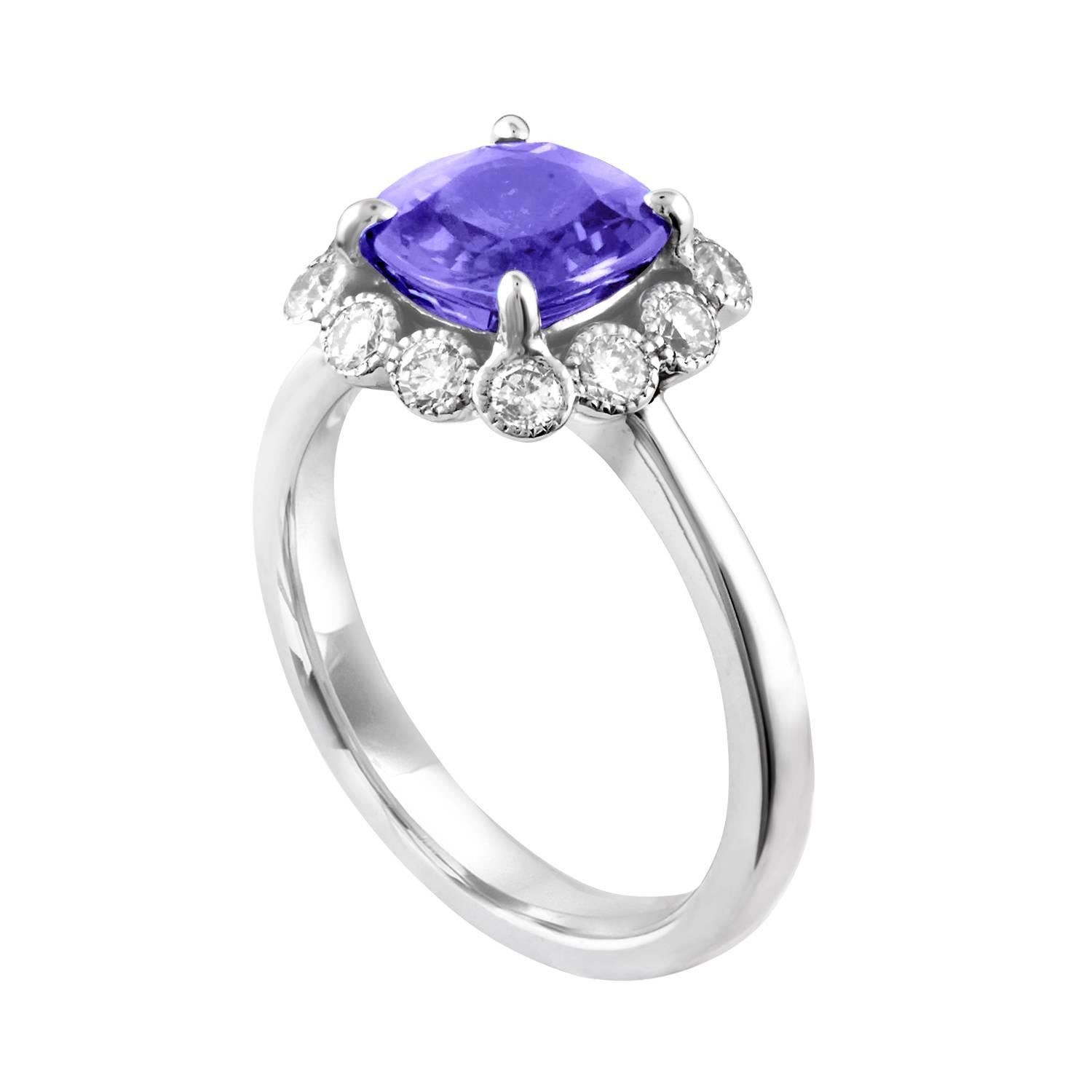 Beautiful Halo Ring
The ring is 14K White Gold
The Center Stone is a Violetish Blue Sapphire 2.59 Carats NO HEAT
The Sapphire is AGL Certified
There are 0.51 Carats in Diamonds G SI
The ring is a size 6.5, sizable
The ring weighs 5.0 grams
