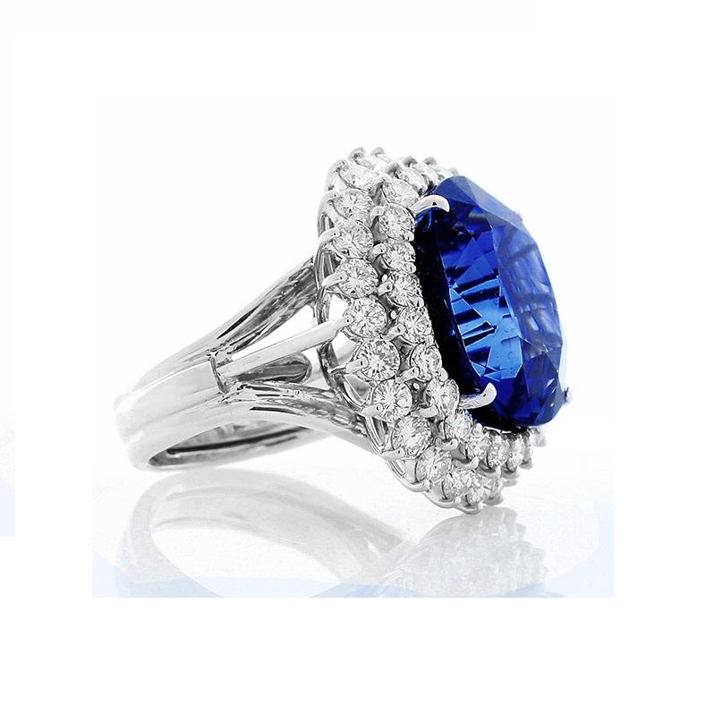 Contemporary AGL Certified 26.14 Carat Oval Non Heated Blue Ceylon Sapphire and Diamond Ring