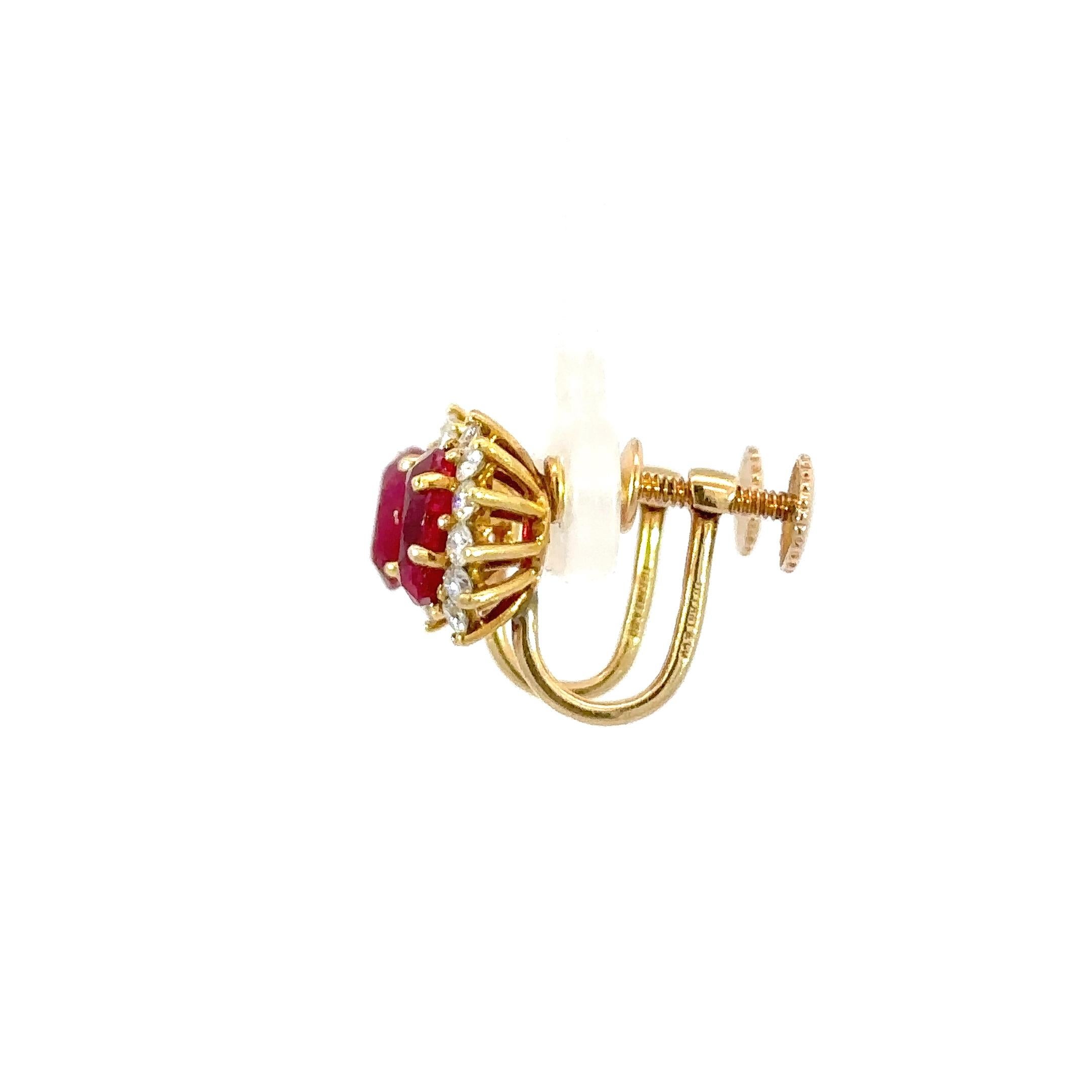 AGL Certification is available.

Introducing our AGL Certified 2.94 total Carat weight Ruby and Diamond 18K Yellow Gold Earrings—a harmonious fusion of luxury encircled by a halo of brilliant-cut diamonds set in the warm embrace of 18K yellow gold.