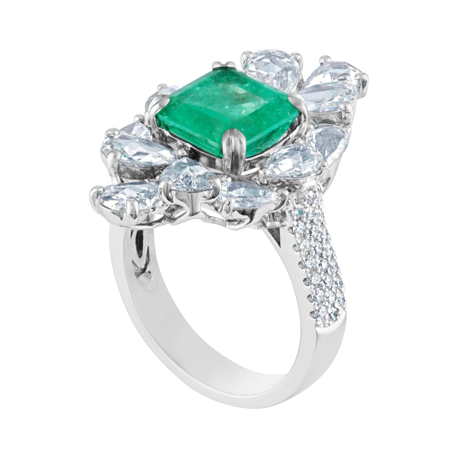 Emerald Ring to Envy
The ring is 18K White Gold
The Emerald is 2.99 Carats Square Emerald Cut
The Emerald is AGL Certified Oil Treatment Only
There are 2.04 Carats in Rose Cut Diamonds G VS
There are 0.32 Carats in Round Diamonds G VS
The ring is a