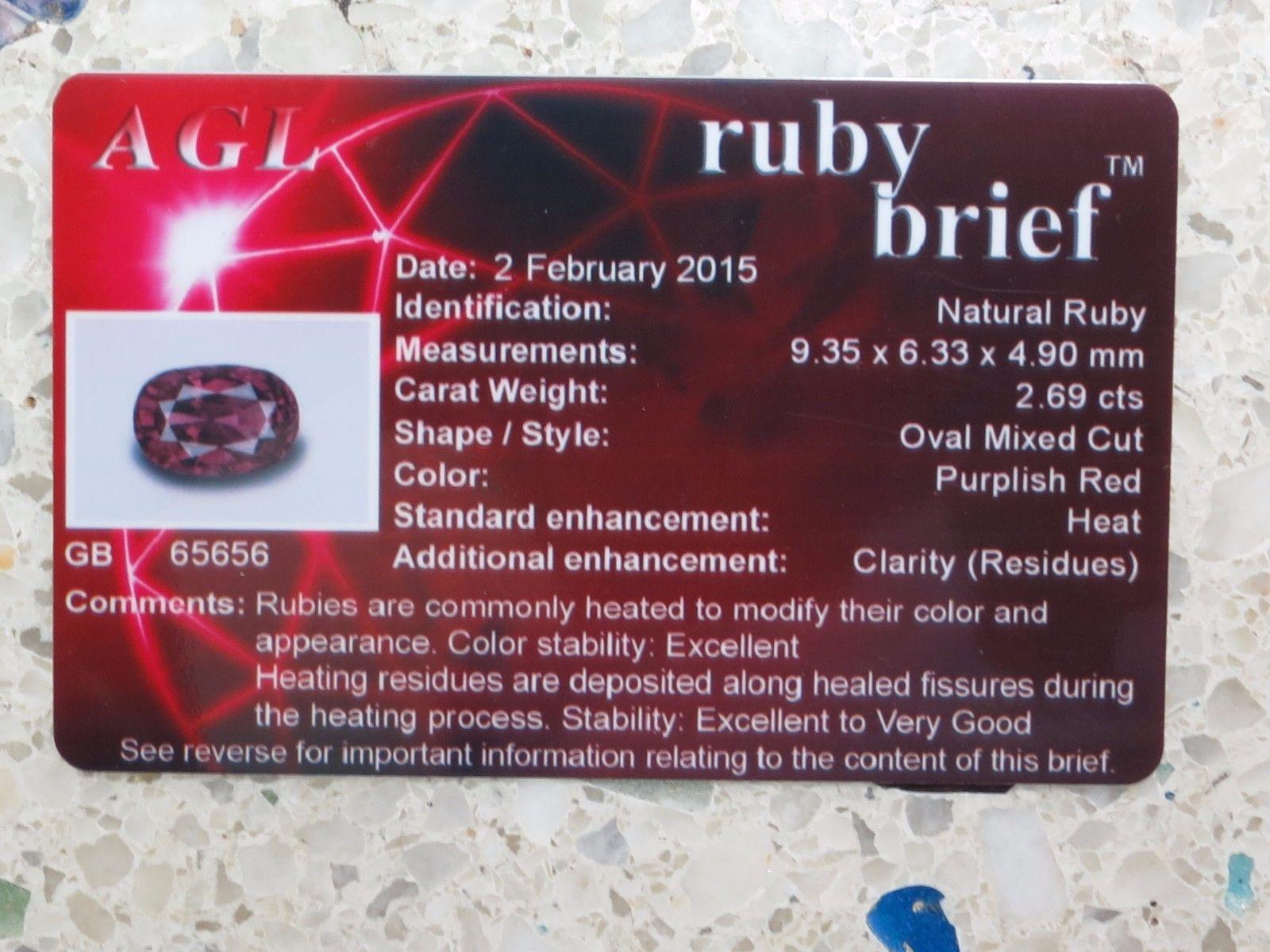 AGL Certified 2.69Ct Natural Ruby Ring

Oval Mixed Cut

Standard Heat 

Excellent color stability 

Purplish Red.

Excellent cut

Clean Clarity

Round Diamonds: .30ct.

G-color Vs-2 clarity.

18kt. white gold



current ring size: 

6.5

& 

can be