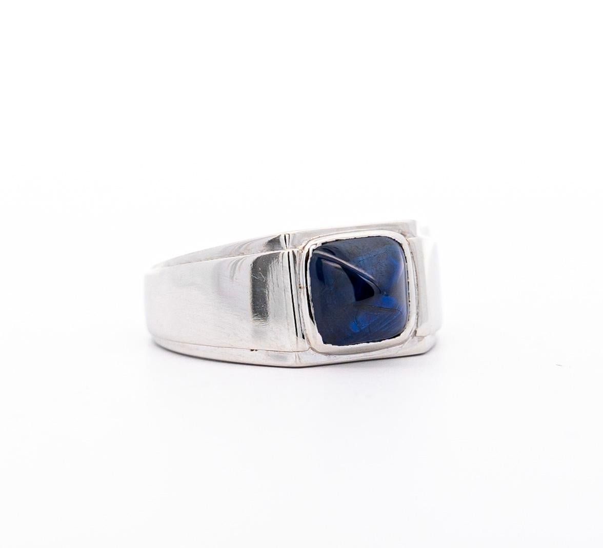 AGL Certified 3.5 carat pryamidal cabochon trillion sapphire. The sapphire is solitaire bezel set in platinum and weighs 13.8 grams total. Sapphire is originated from Thailand and bears no heat treatment. Vintage, circa 1980. 

The center stone has