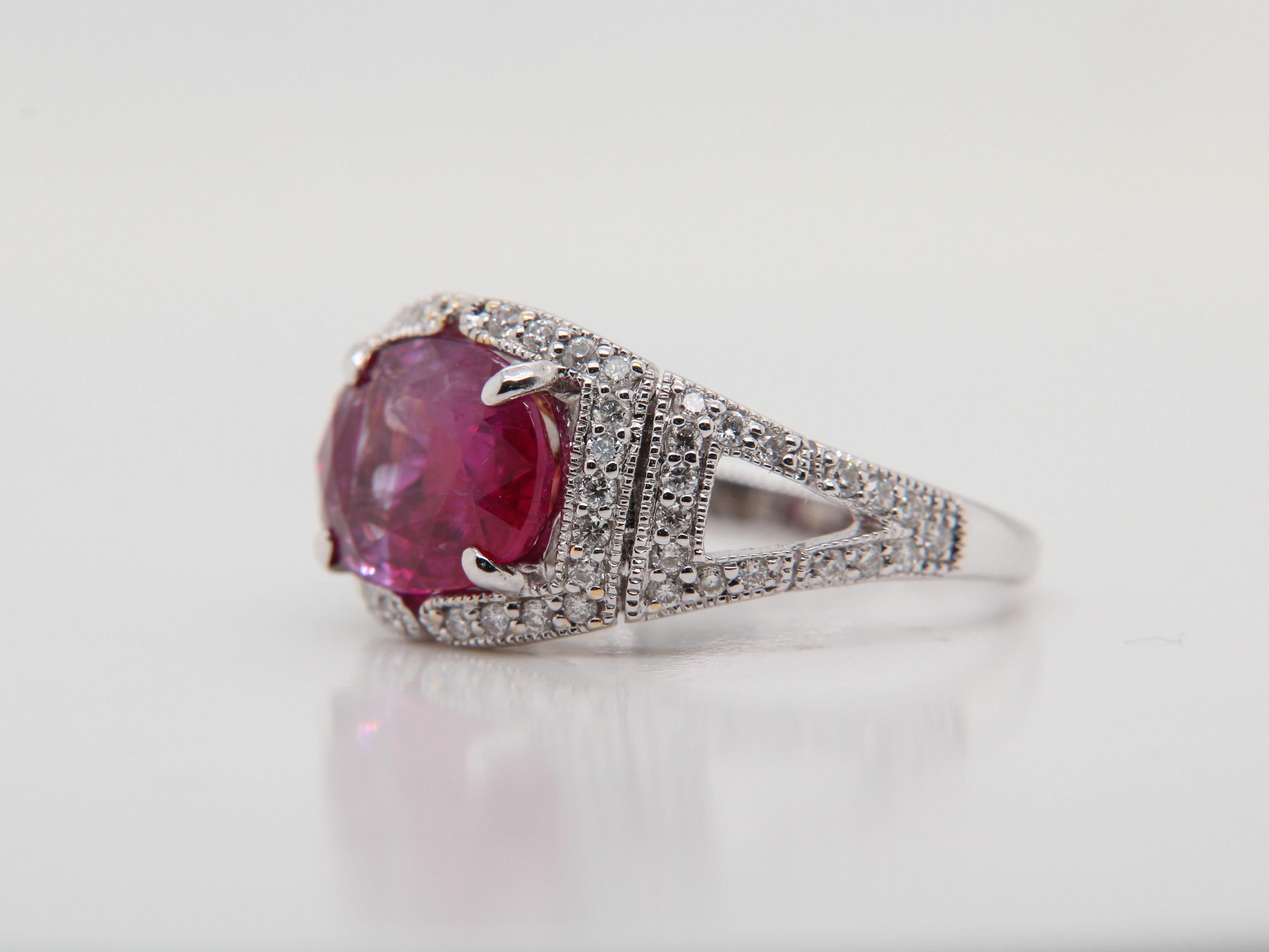 A brand new AGL (Thai) certified 3.56 burma ruby no heat purplish red and diamond ring in 18 karat gold . The ruby weigh 3.56 carat and diamond weigh 0.39 carat. The total ring weight is 4.87 grams. The ring size US 5.50 and EU 51.