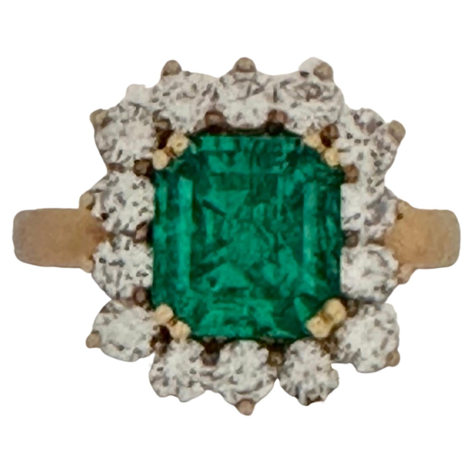 
AGL Certified 3.85 Ct Colombian Minor Traditional Emerald & Diamond Ring  18K Yellow Gold
A Classic, ring 
3.85 Carat  Colombian Emerald Absolutely gorgeous emerald , Very desirable color , Extreme fine quality ,color and luster
18 Karat Yellow
