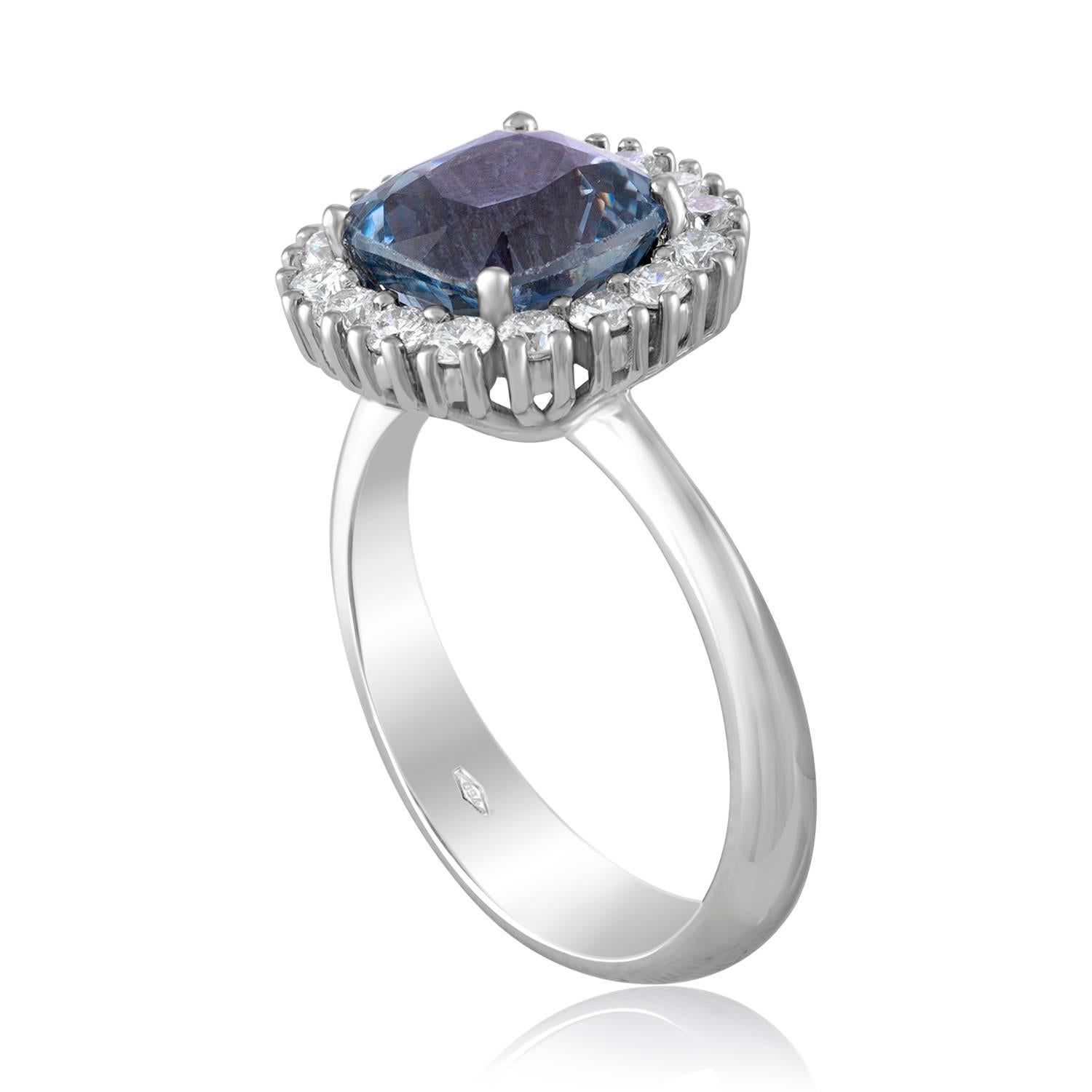 Beautiful Cushion Halo Ring.
The ring is 18K White Gold.
The center stone is a cushion 3.97 Carat Grayish Blue-Violet Sapphire.
The Sapphire is NO HEAT and is certified by AGL. 
The ring has 0.54 Carats F/G VS.
The top of the ring measures 0.50