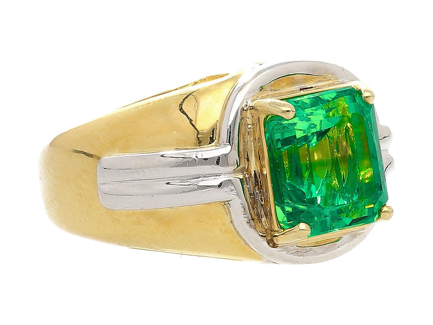 AGL Certified investment grade Emerald mens ring. The center stone is a 3.98 carat Colombian Emerald with minor oil. 

Set in a heavy two-tone 18k yellow gold and platinum setting. Ring size 8.5, adjustable. 

Details:
Item Type: Men's Ring
Metal: